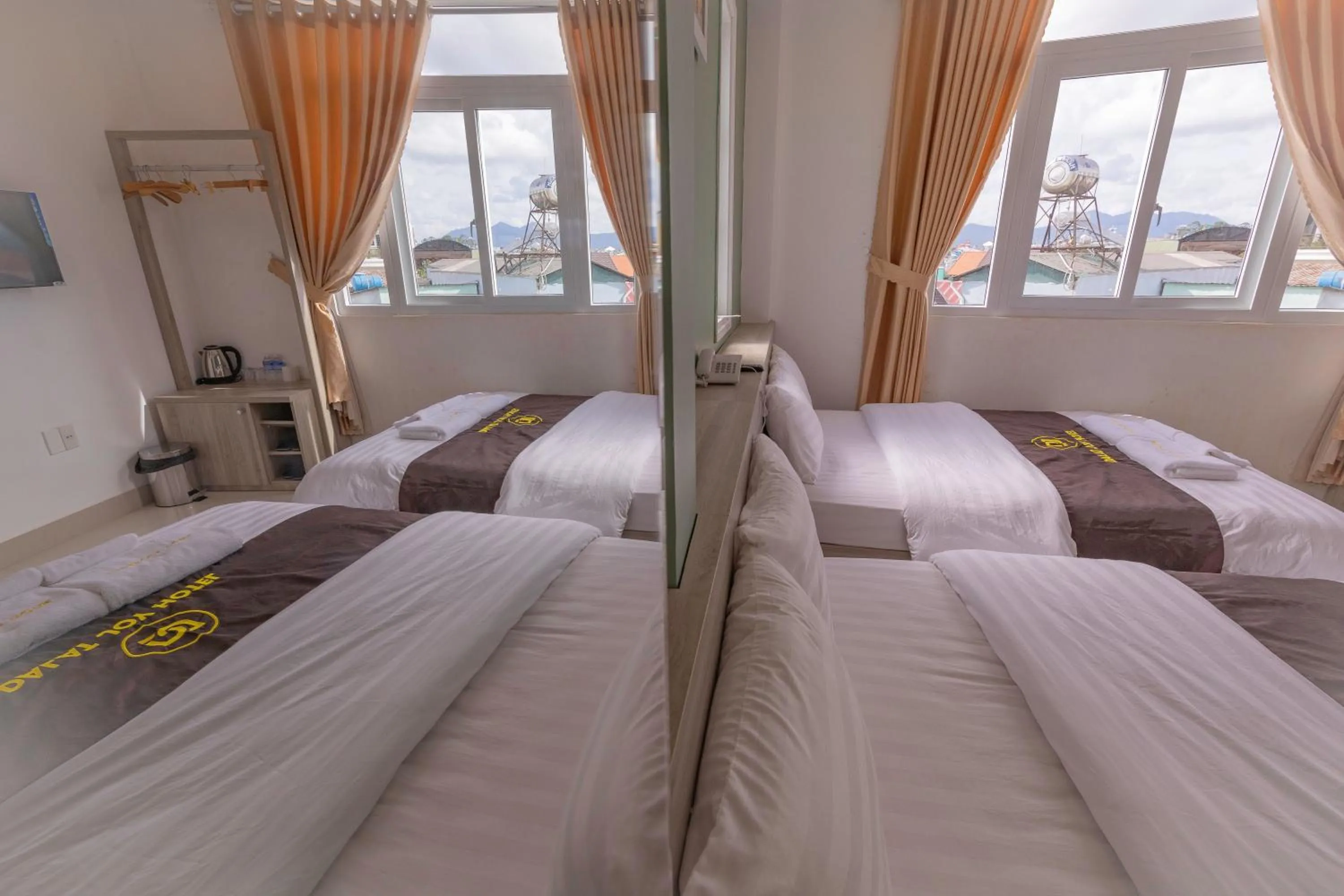 Bed in Dalat Joy Hotel