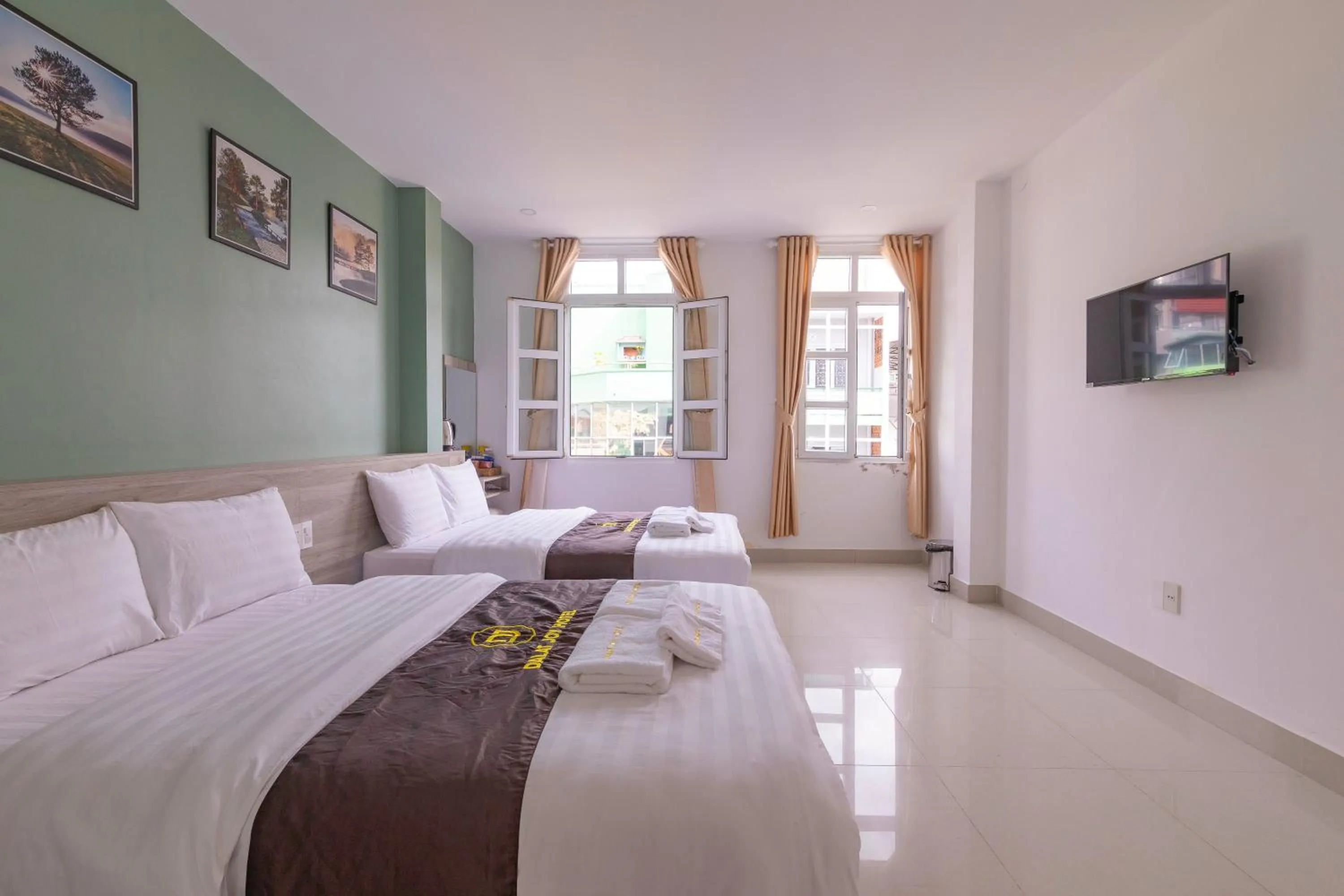 Bed in Dalat Joy Hotel