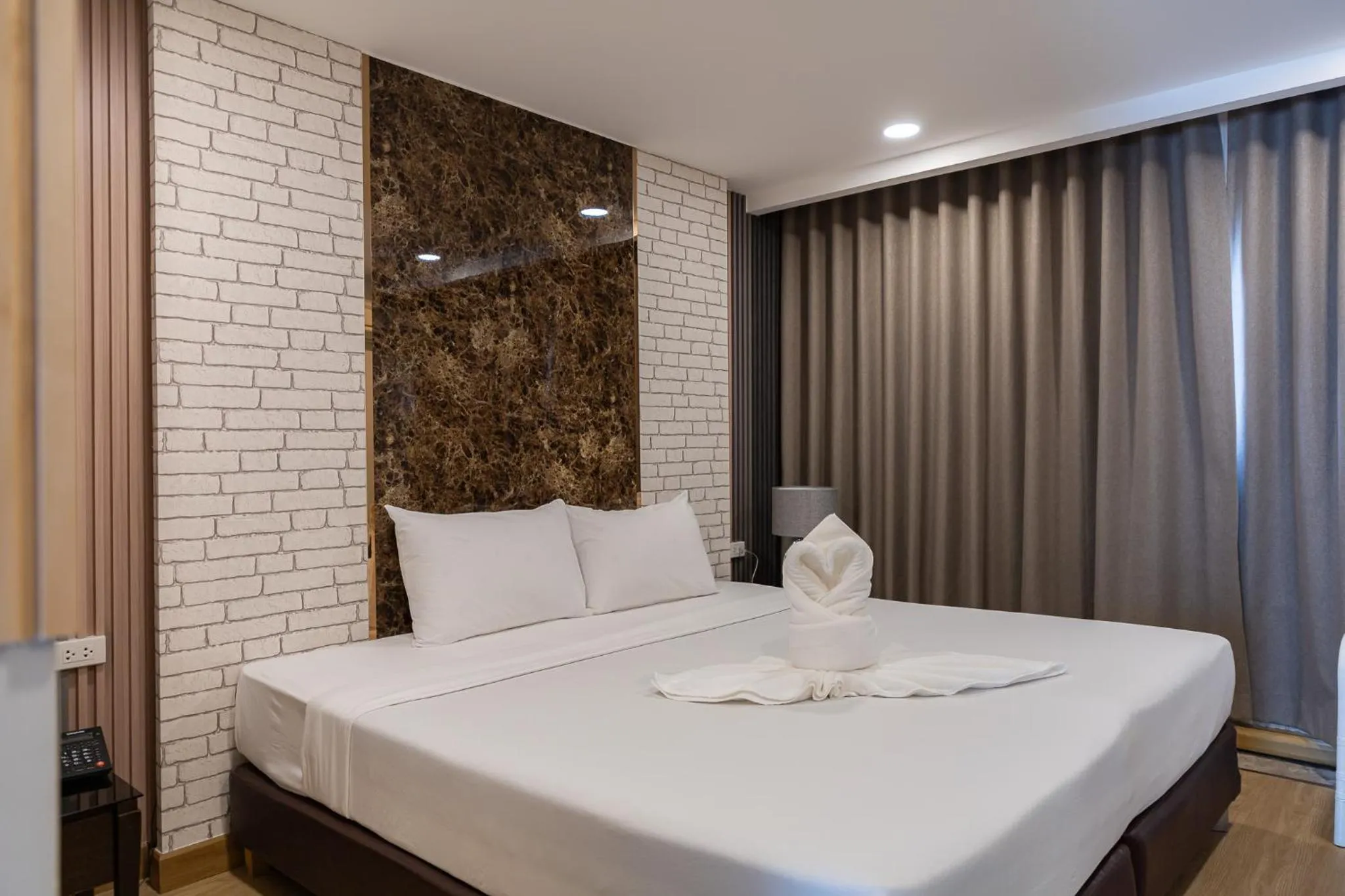 Bed in Hotel Pattaya Beach