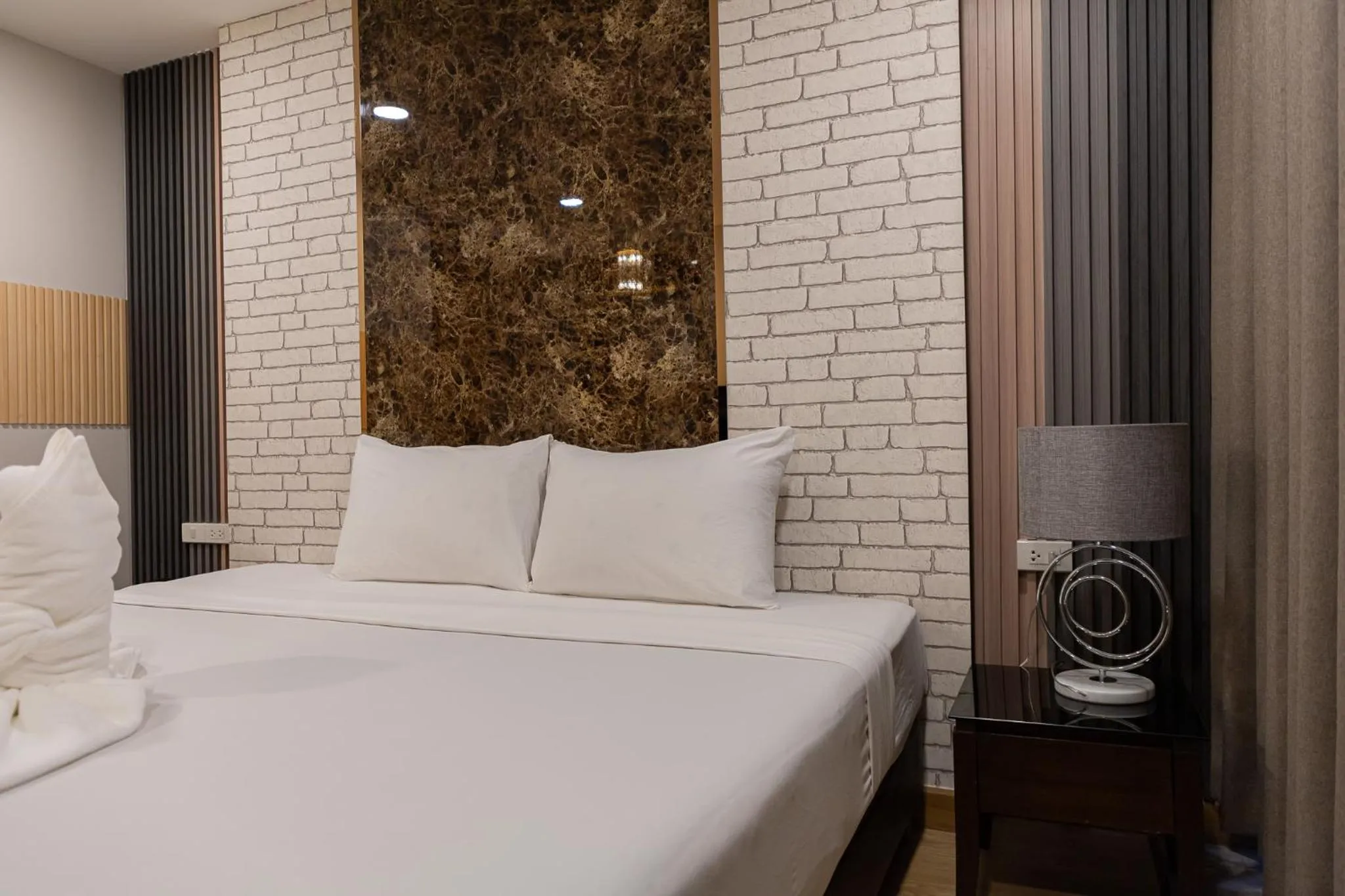 Bed in Hotel Pattaya Beach