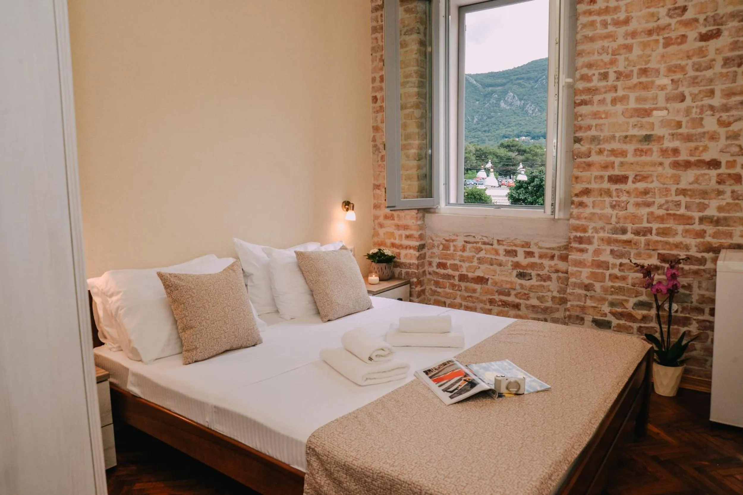 Bed in Step to Kotor bay Guesthouse