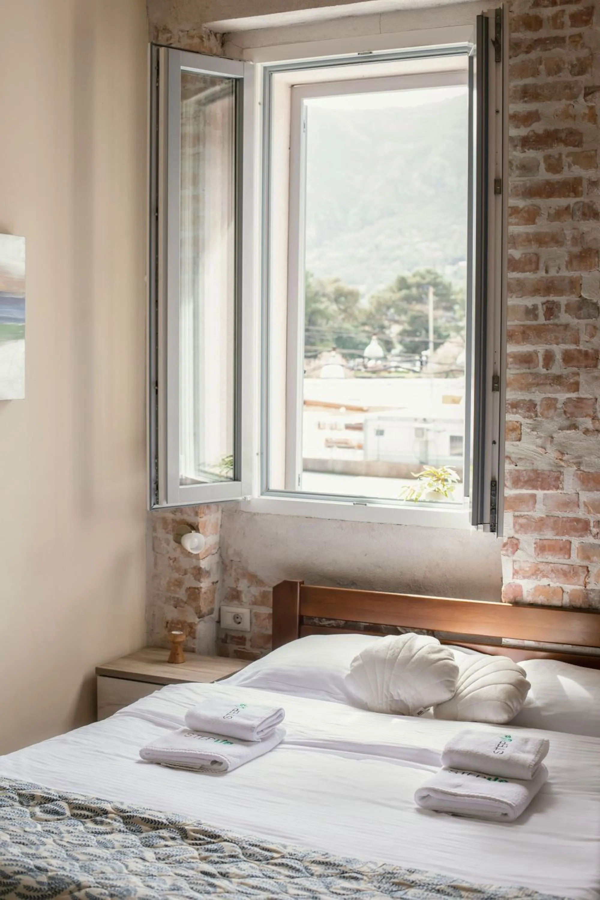 Bed in Step to Kotor bay Guesthouse