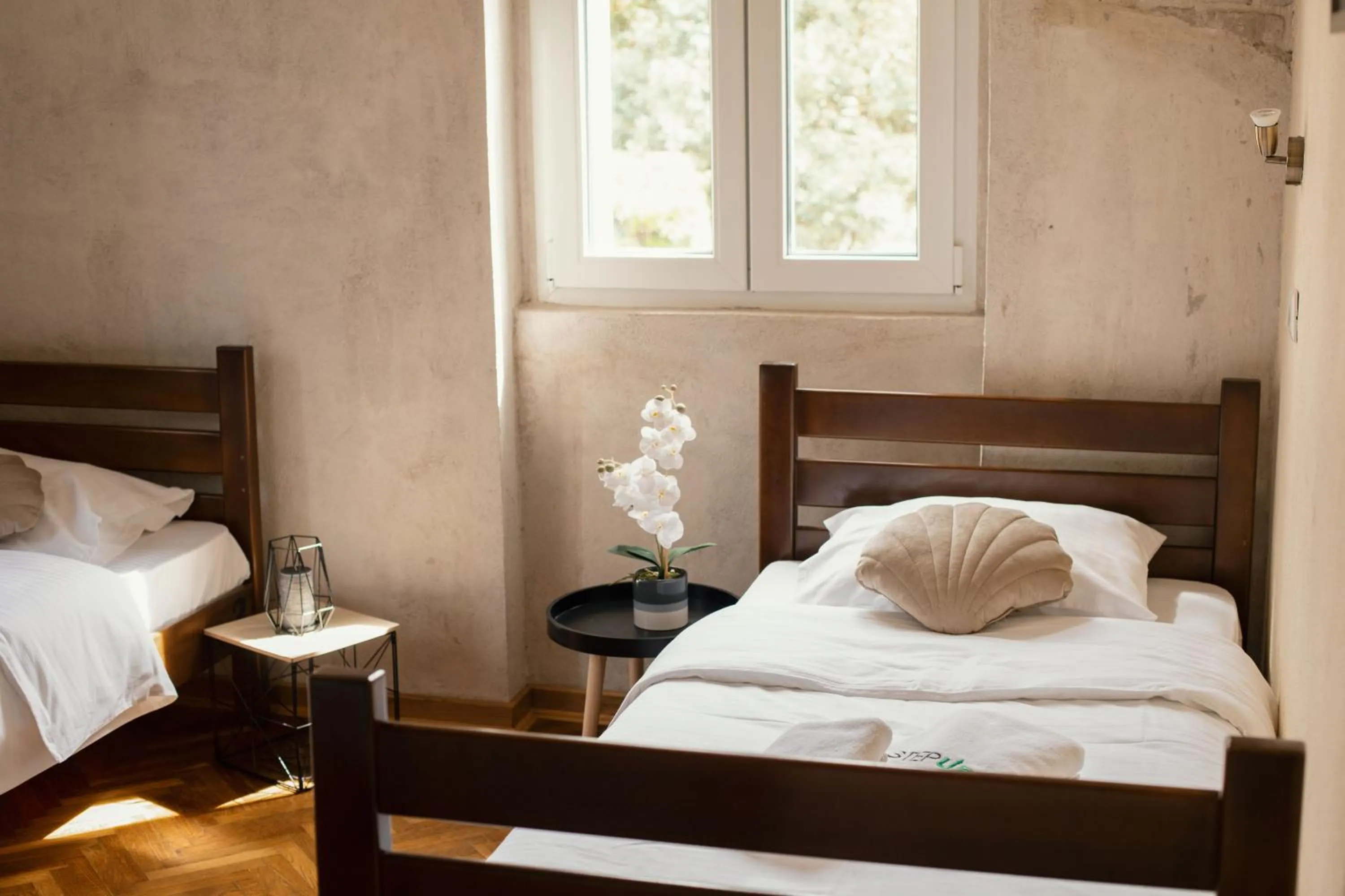 Bed in Step to Kotor bay Guesthouse