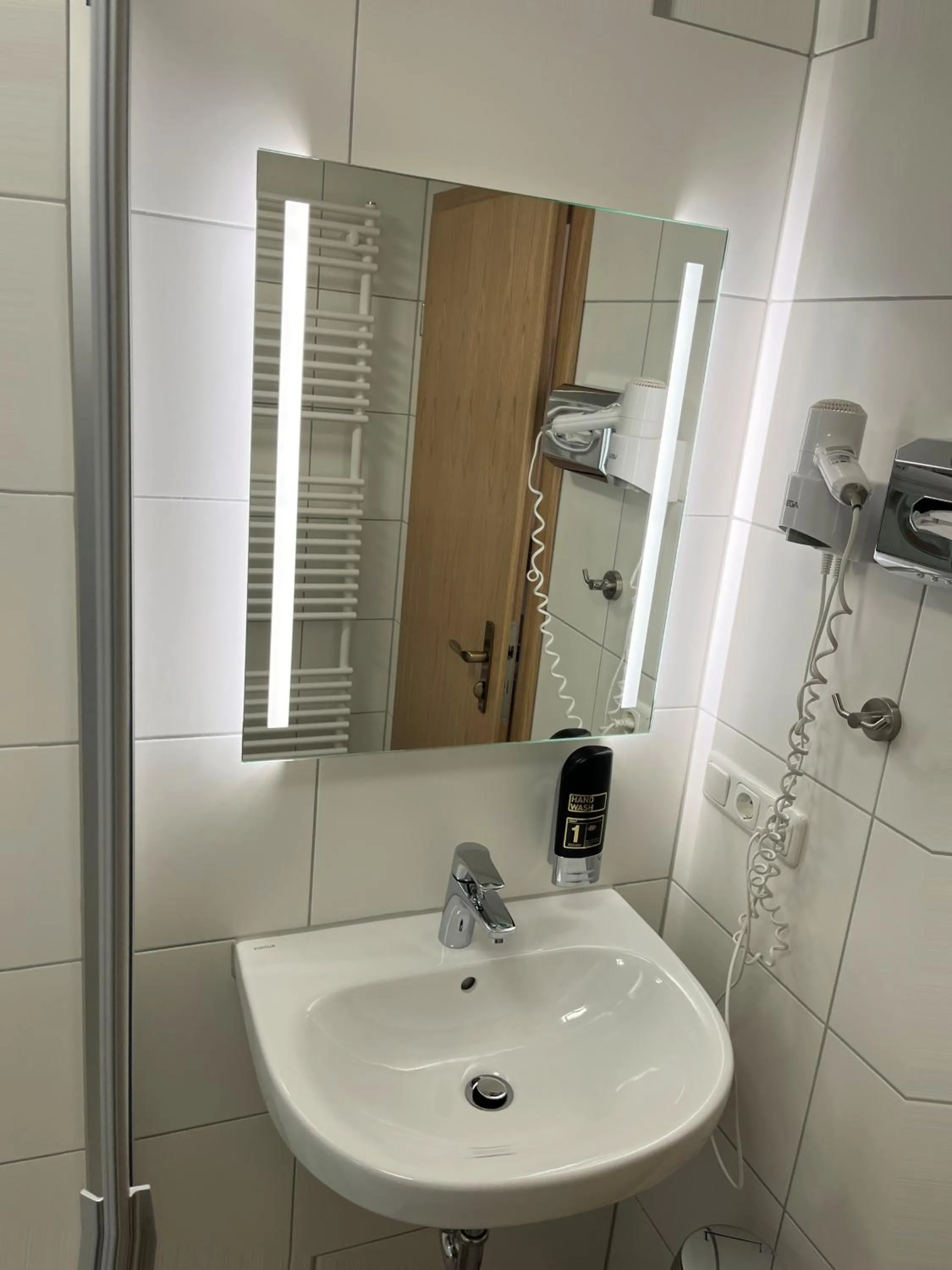 Bathroom in Gästehaus Forggensee