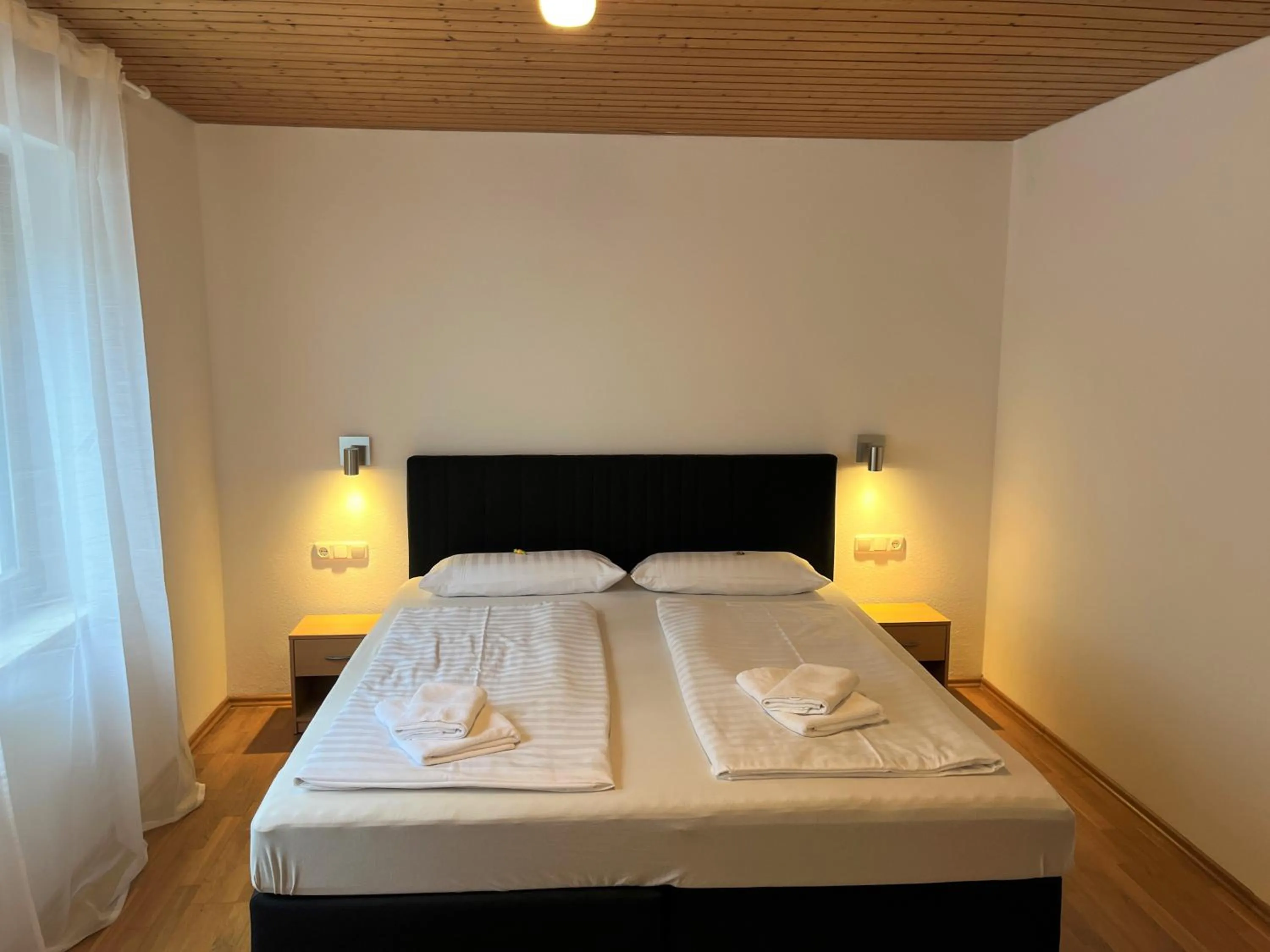 Bedroom, Bed in Gästehaus Forggensee