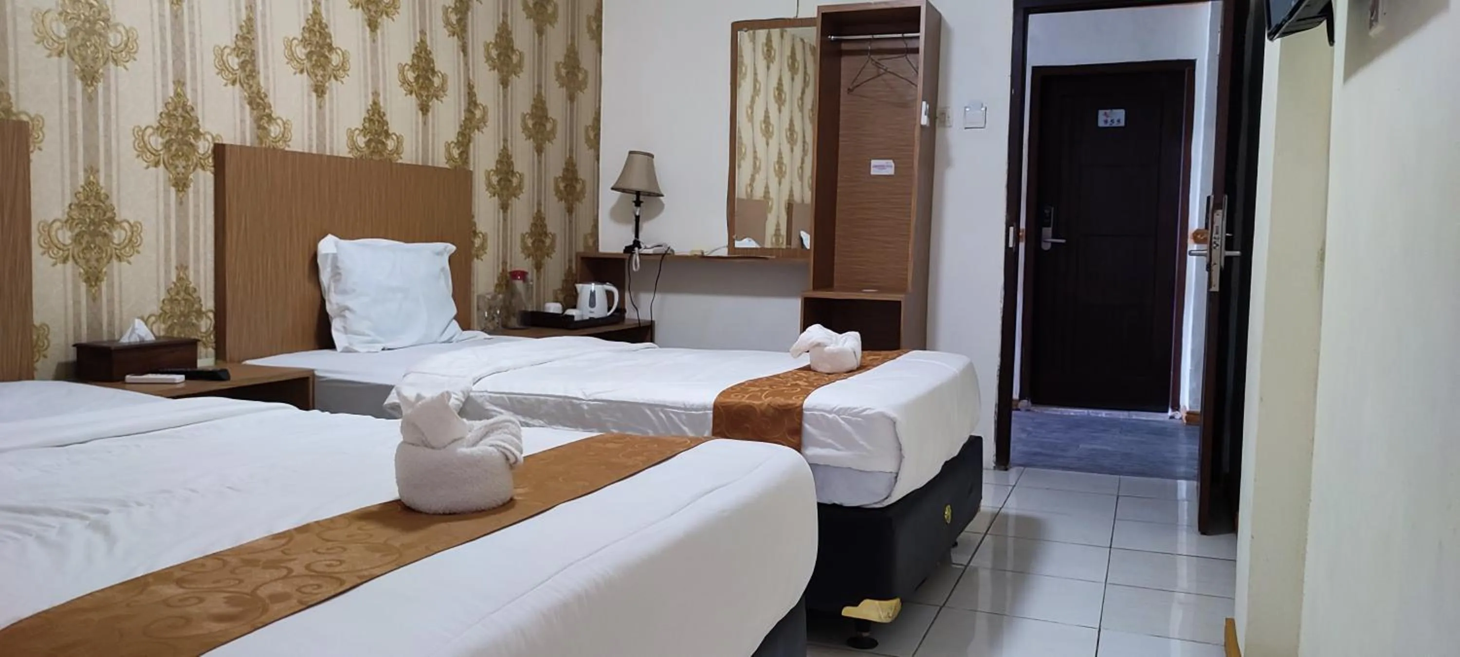 Bed in Votel Hotel De'Pratnya Kediri