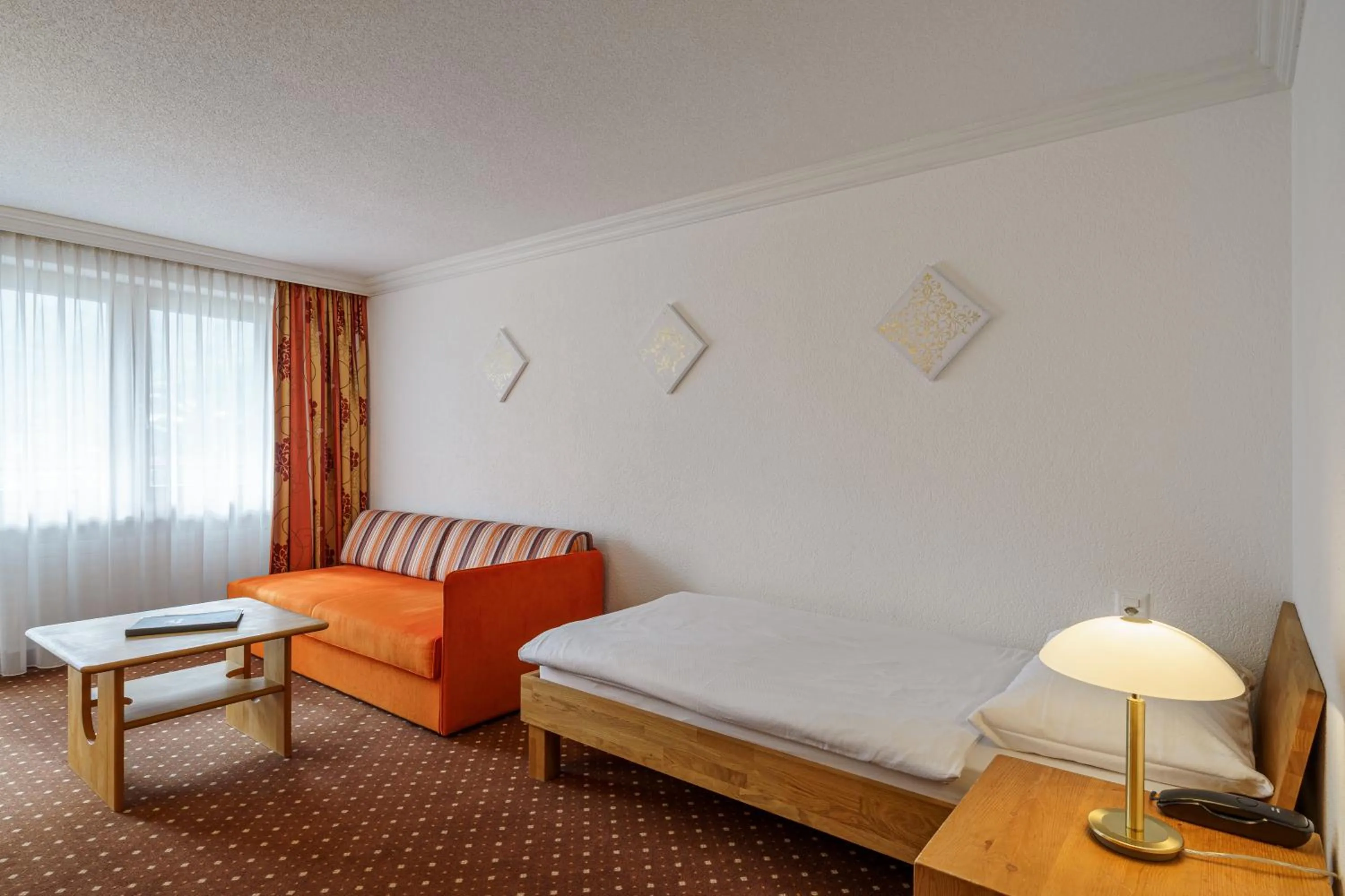 Photo of the whole room, Bed in Hotel Alpenroyal