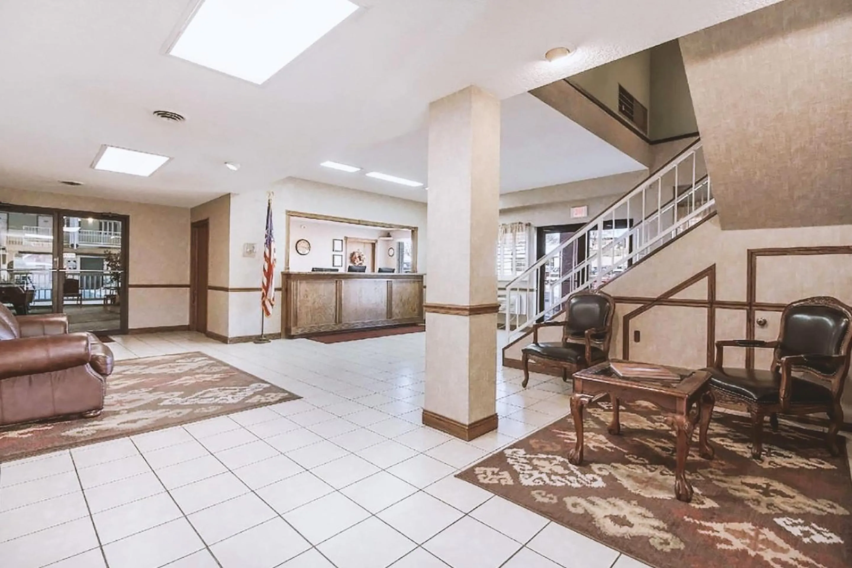 Lobby or reception in Coratel Inn & Suites by Jasper McCook