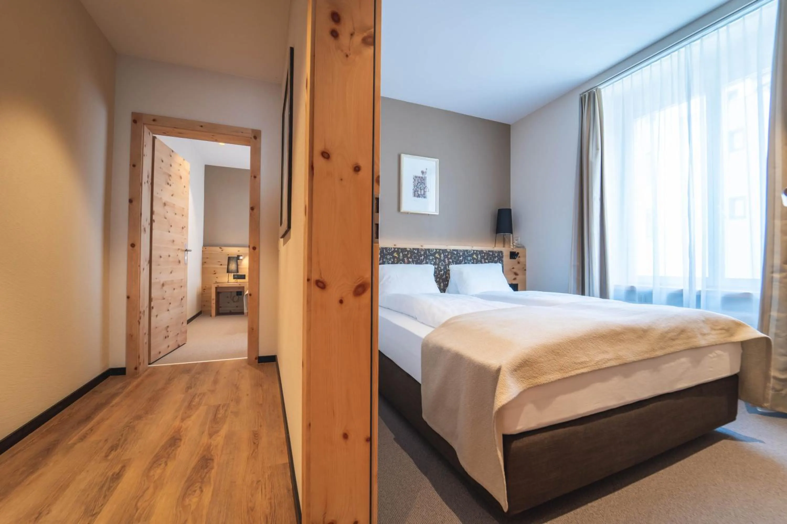 Photo of the whole room, Bed in Sporthotel Pontresina