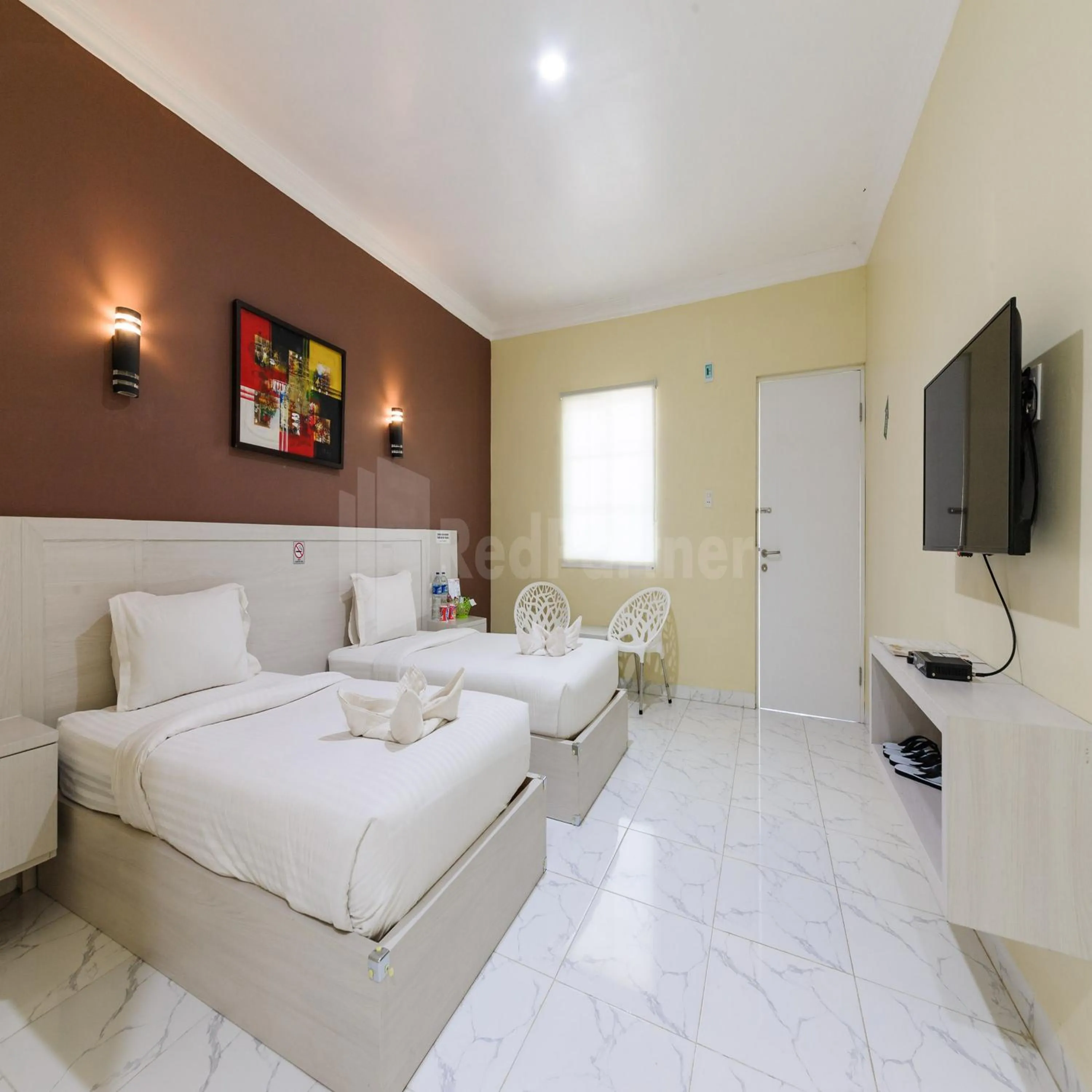 Bedroom, Bed in Hotel 78 Parapat Mitra RedDoorz