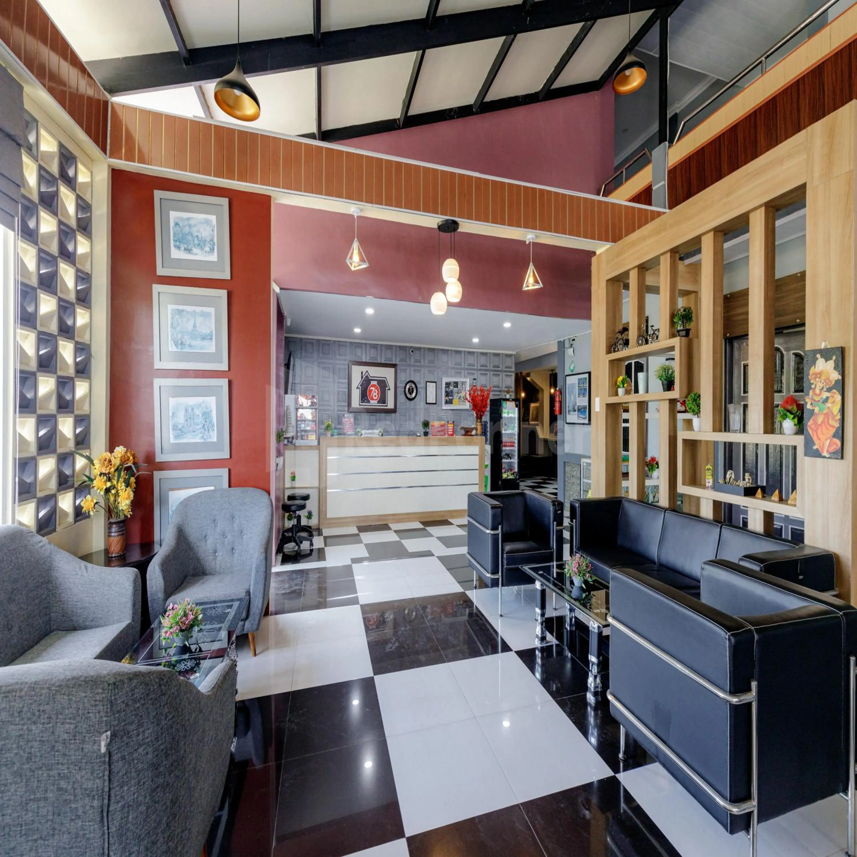 Seating area in Hotel 78 Parapat Mitra RedDoorz