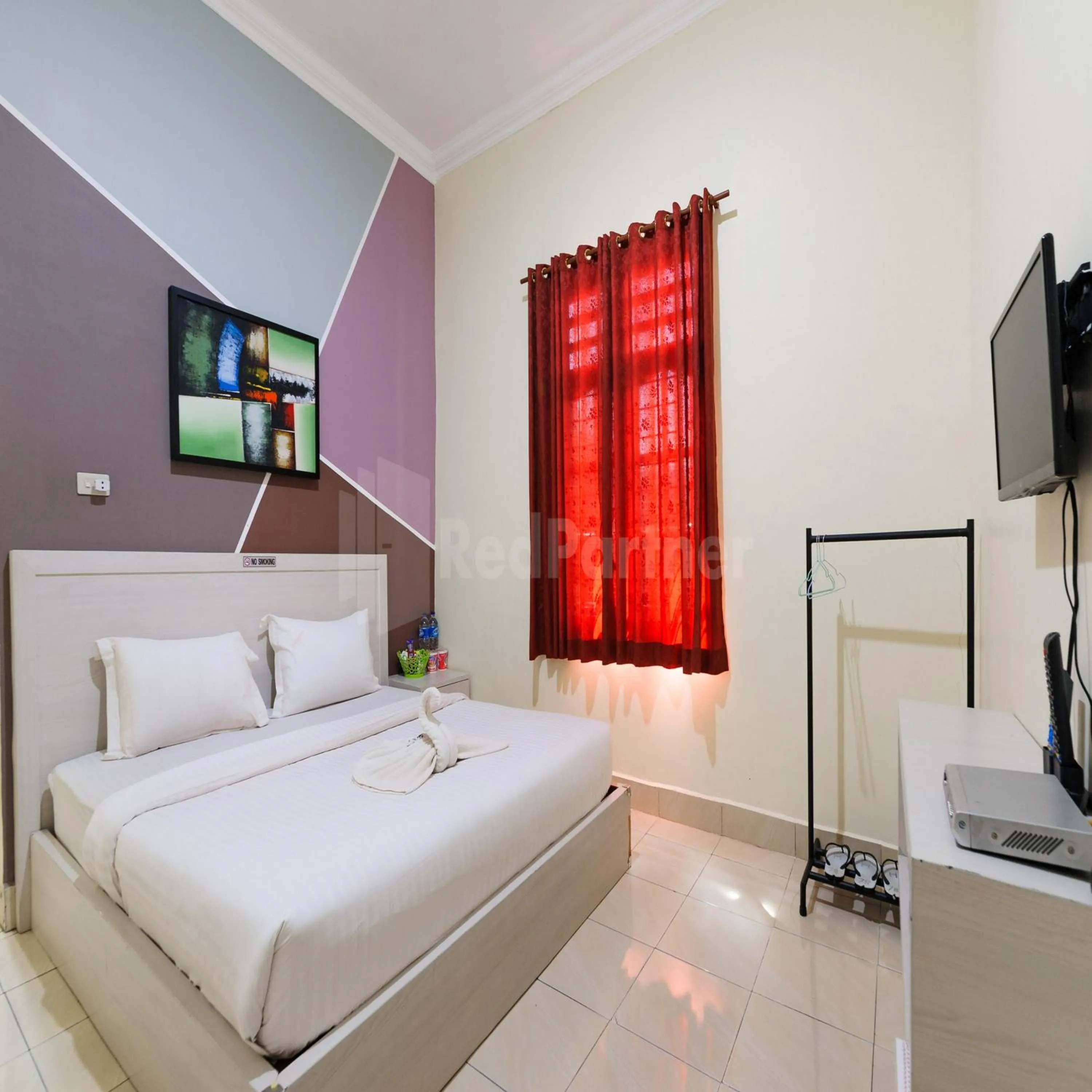 Bedroom, Bed in Hotel 78 Parapat Mitra RedDoorz
