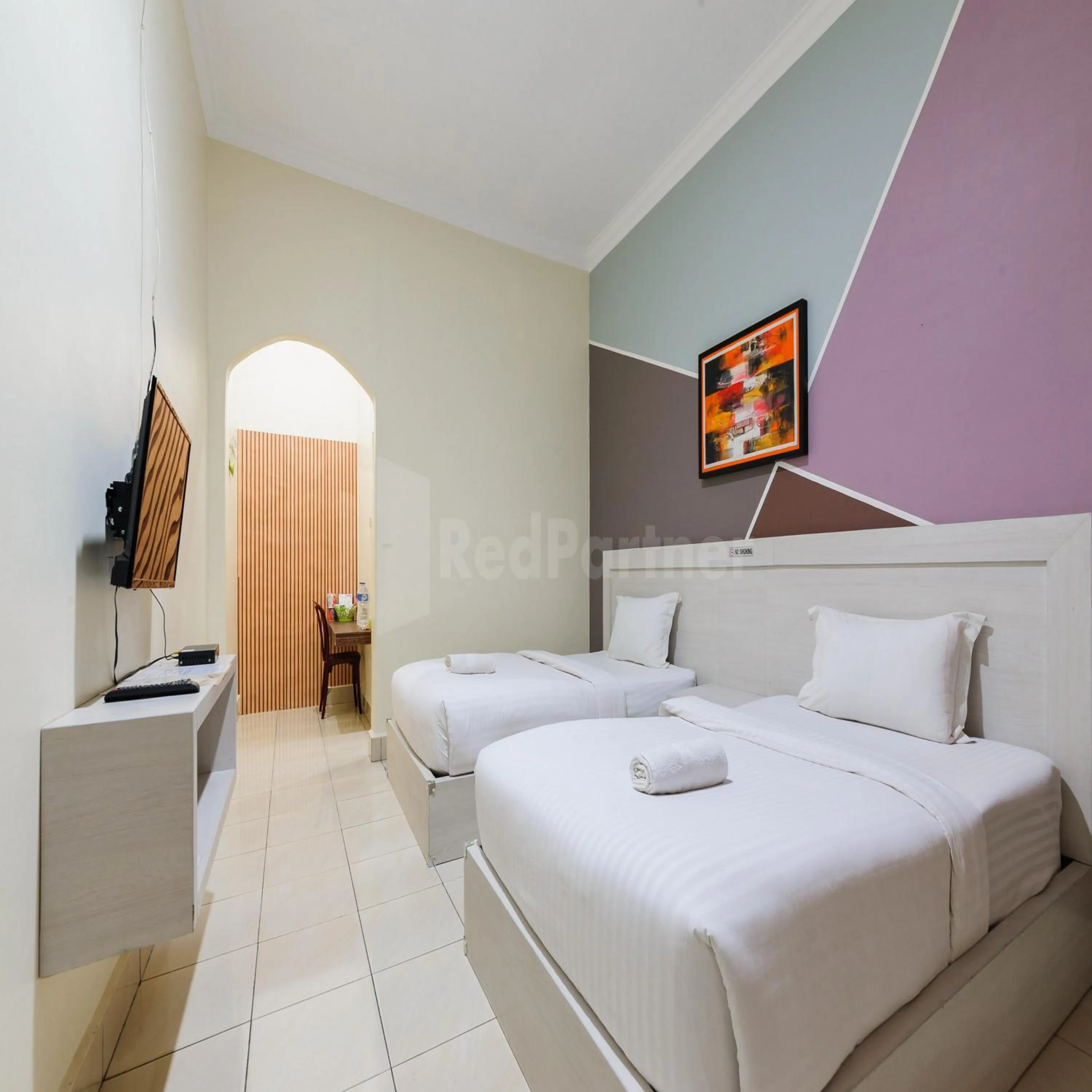 Bedroom, Bed in Hotel 78 Parapat Mitra RedDoorz