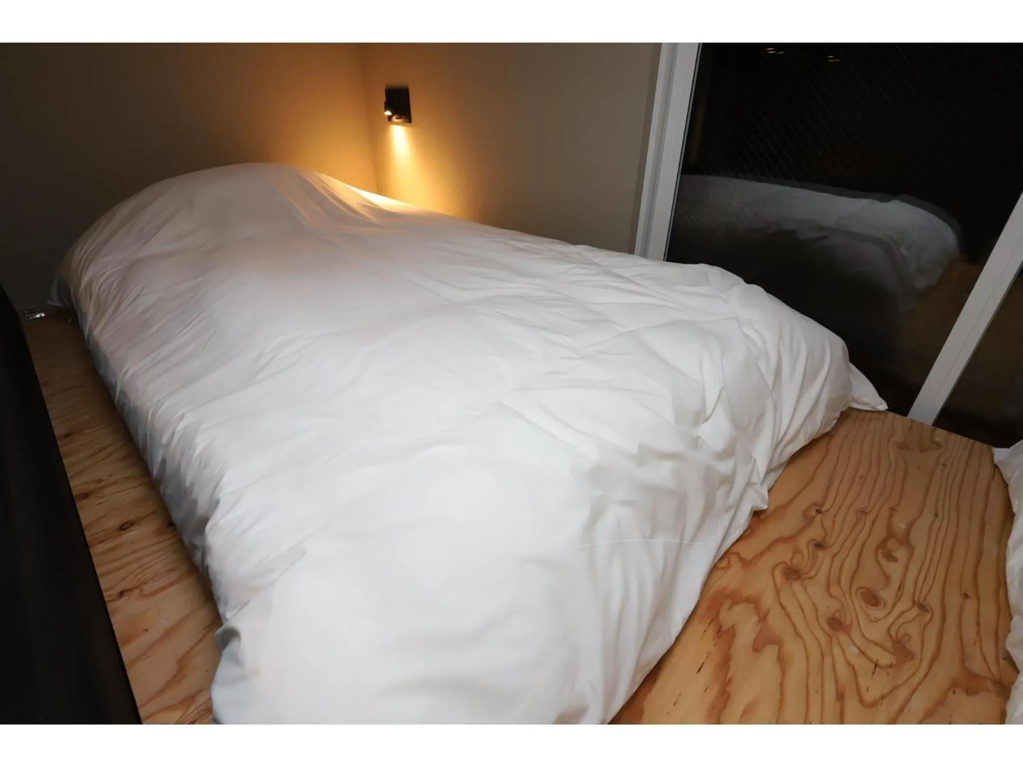 Bed in Uchi Living Stay AOZORA