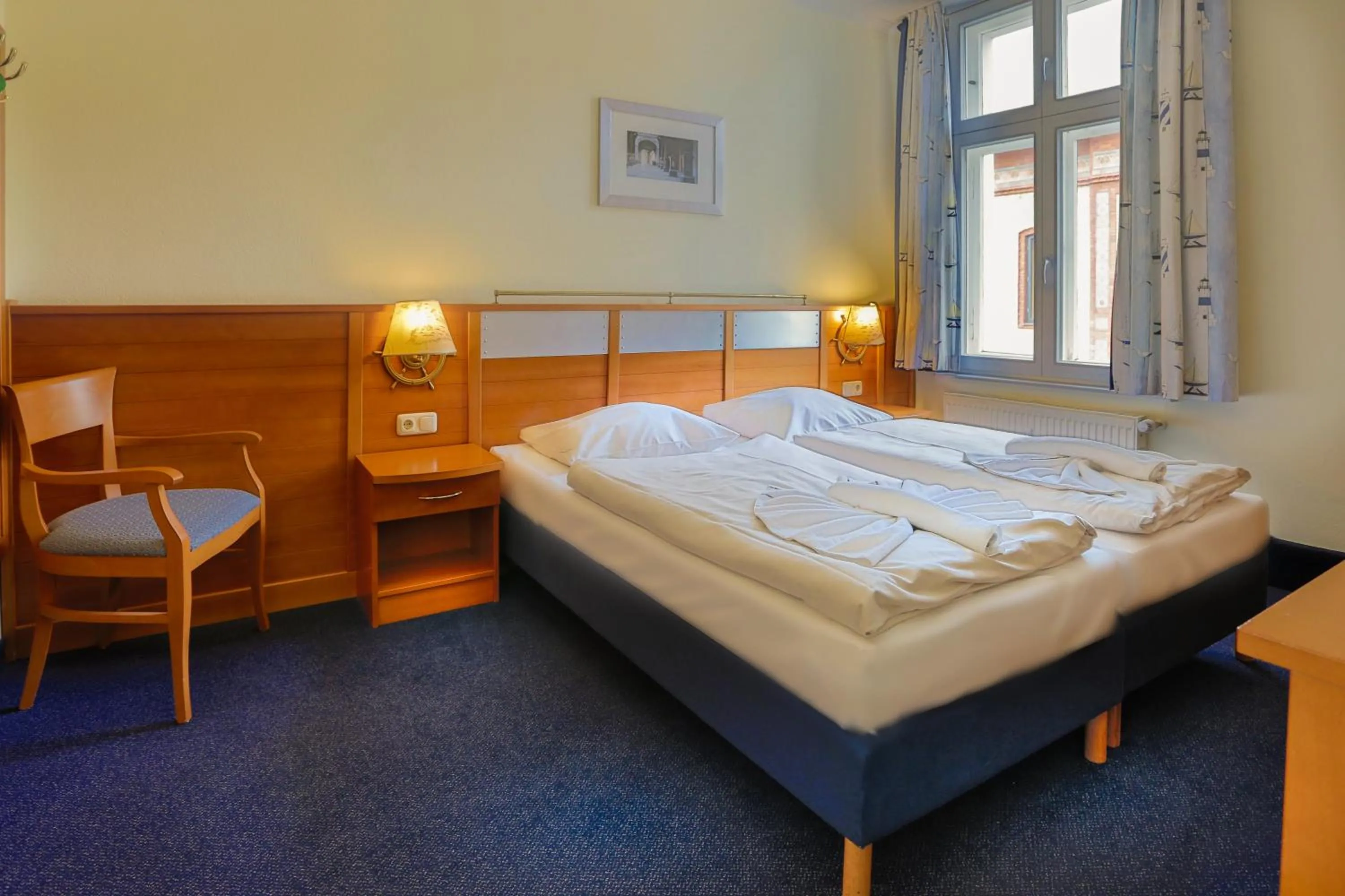 Photo of the whole room, Bed in Hiddenseer Hotel