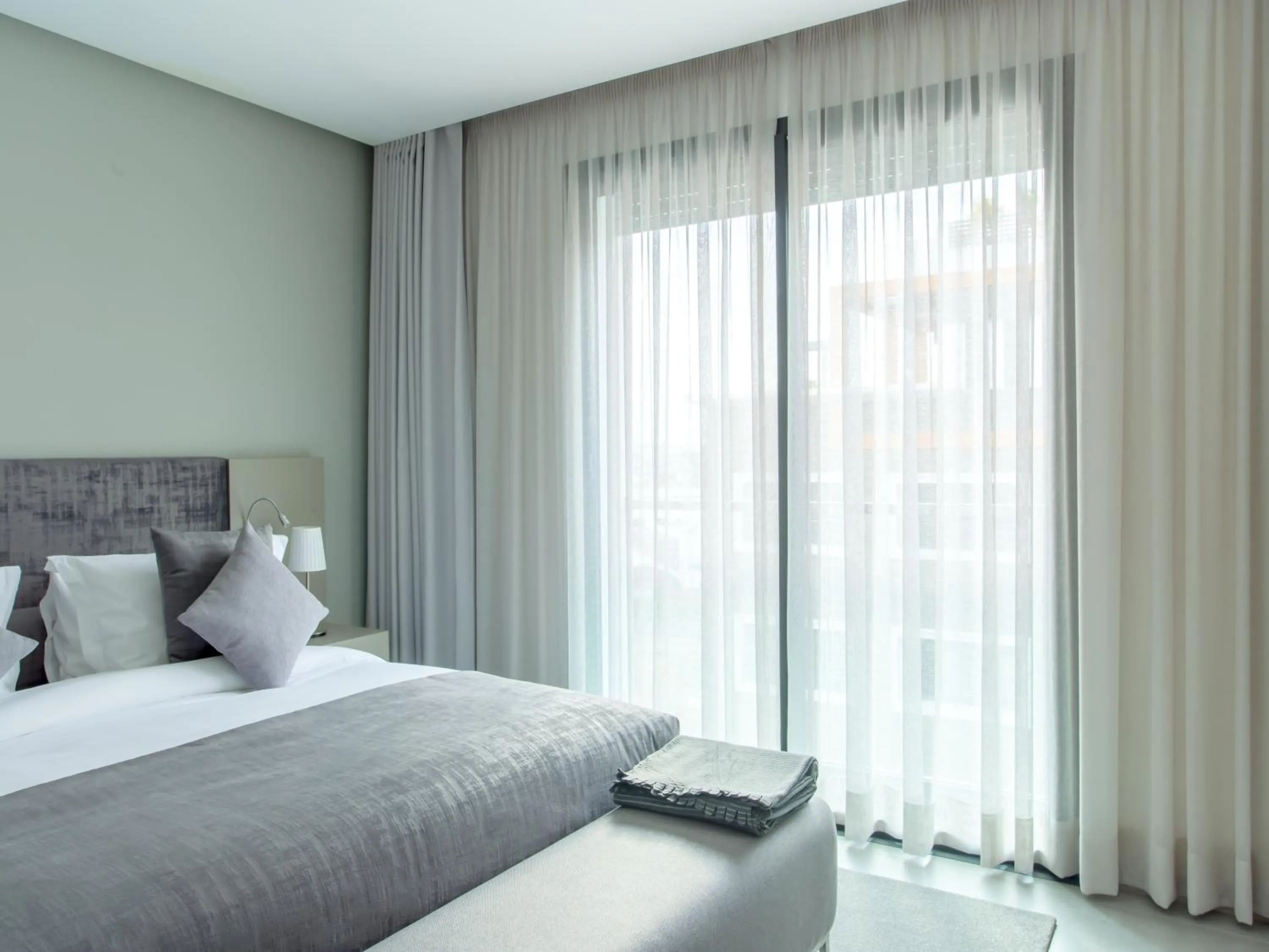 Bed in Makass Appart Hotel