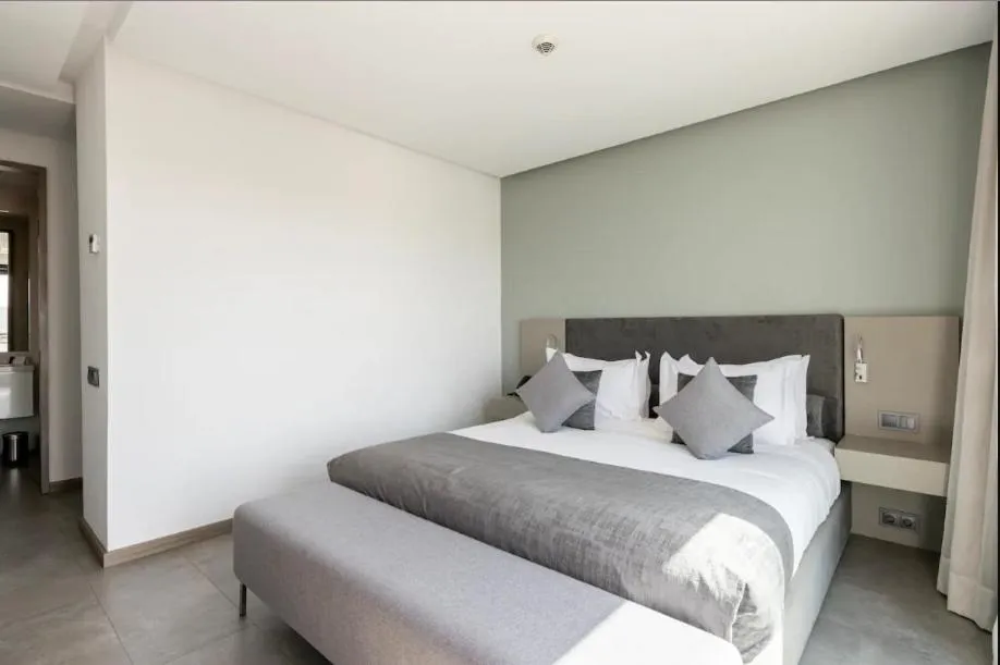 Bed in Makass Appart Hotel