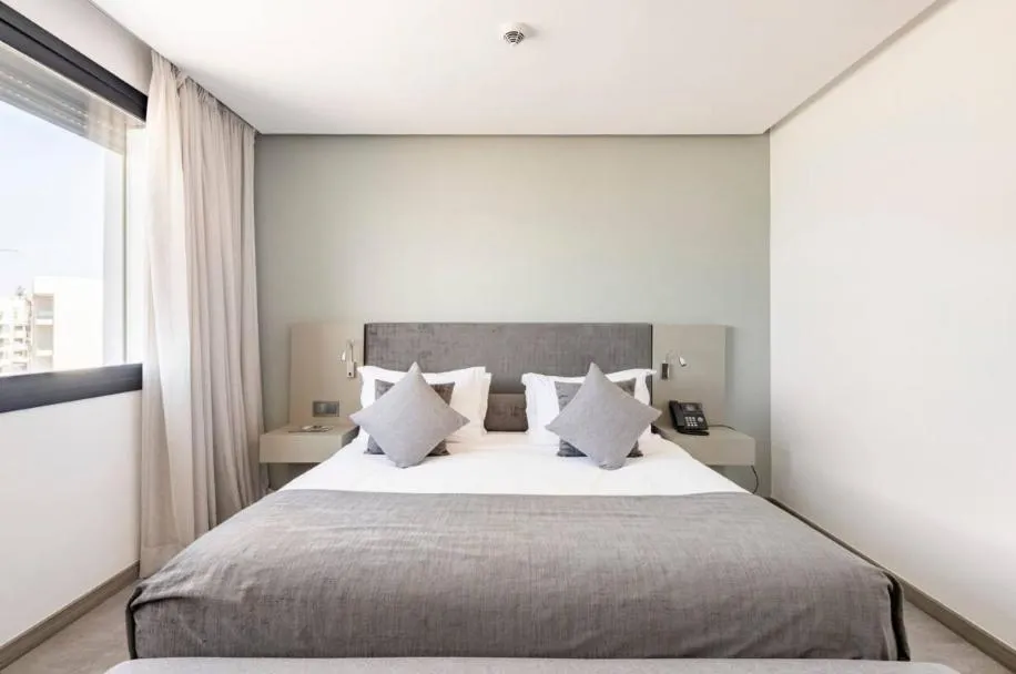 Bedroom, Bed in Makass Appart Hotel