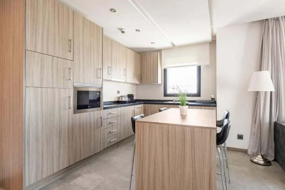 Kitchen or kitchenette in Makass Appart Hotel