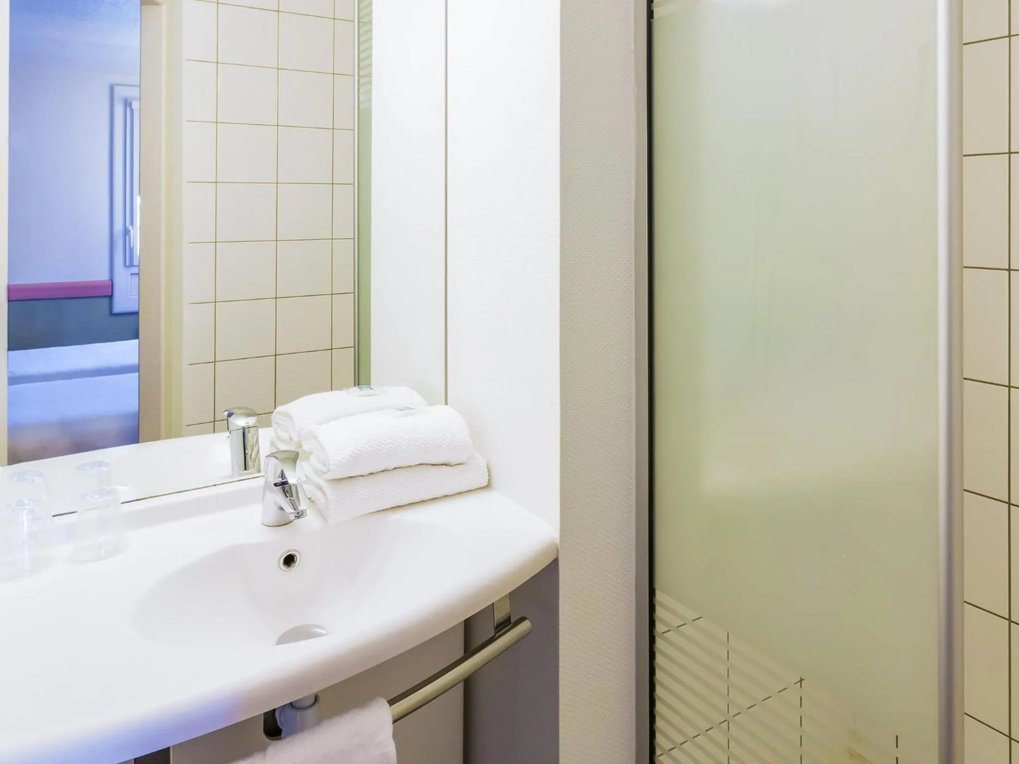 Bedroom in Ibis budget Béziers Est Mediterranée A9 / A75