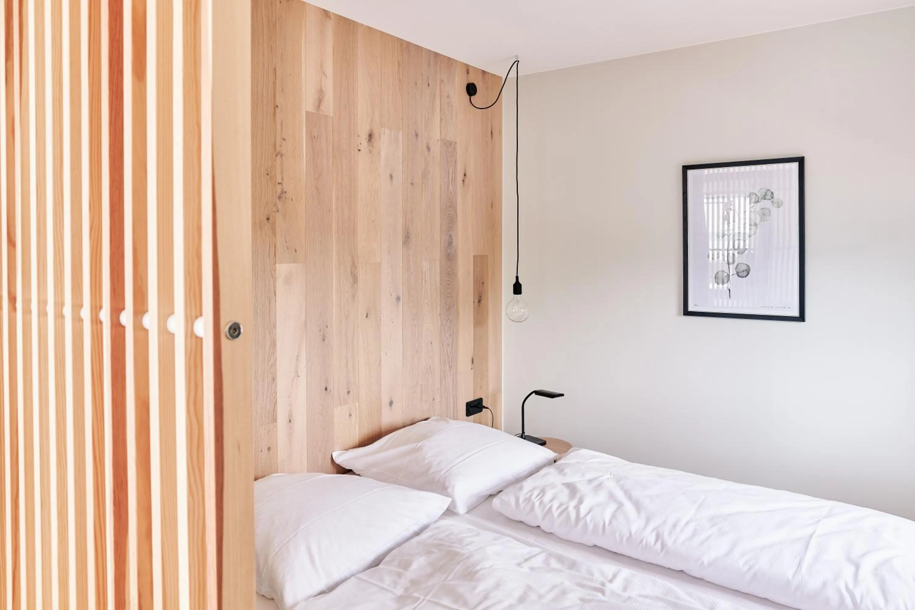 Bed in Designhotel Whitman