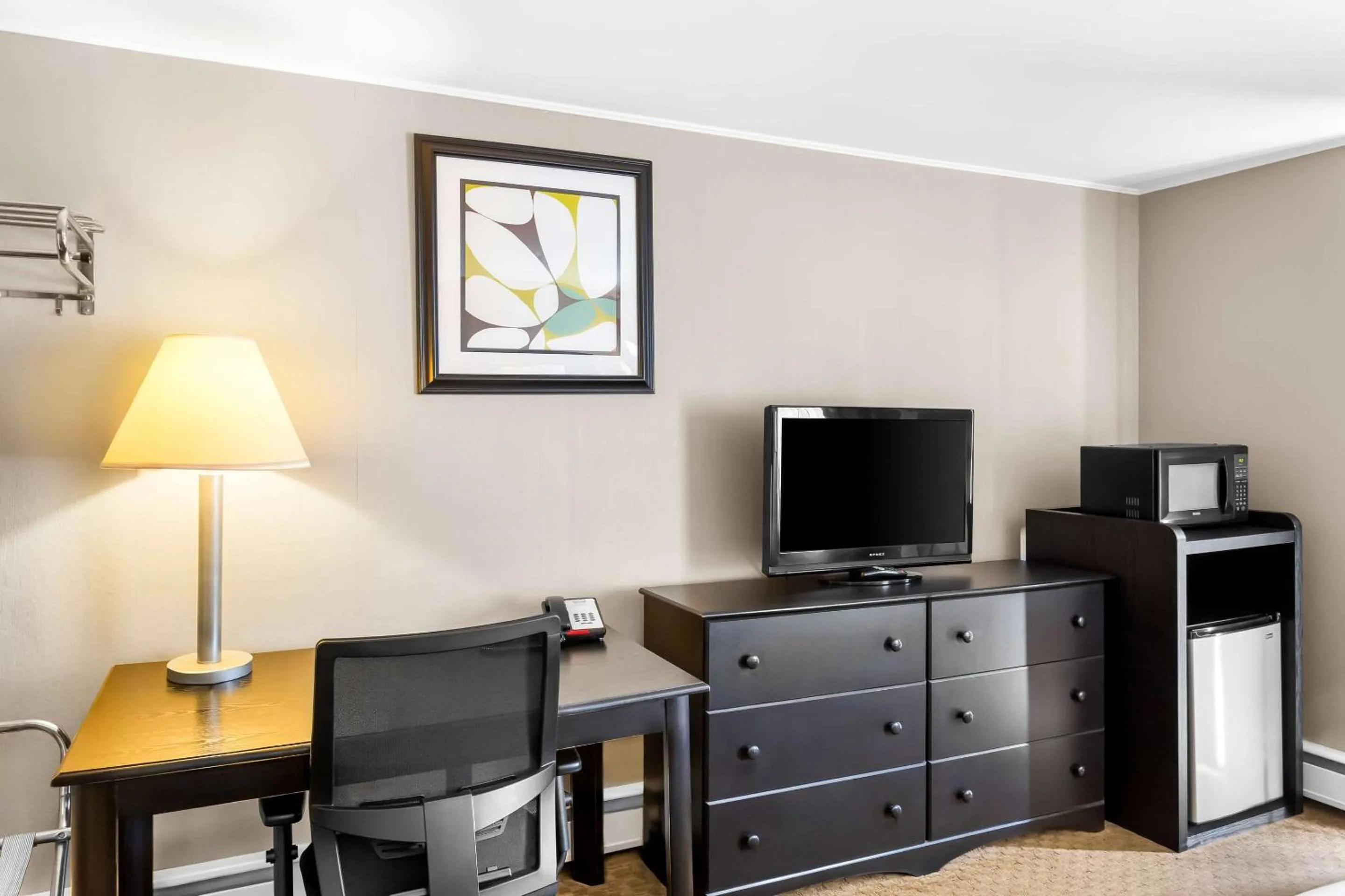 Bedroom in Rodeway Inn Gorham Riverside