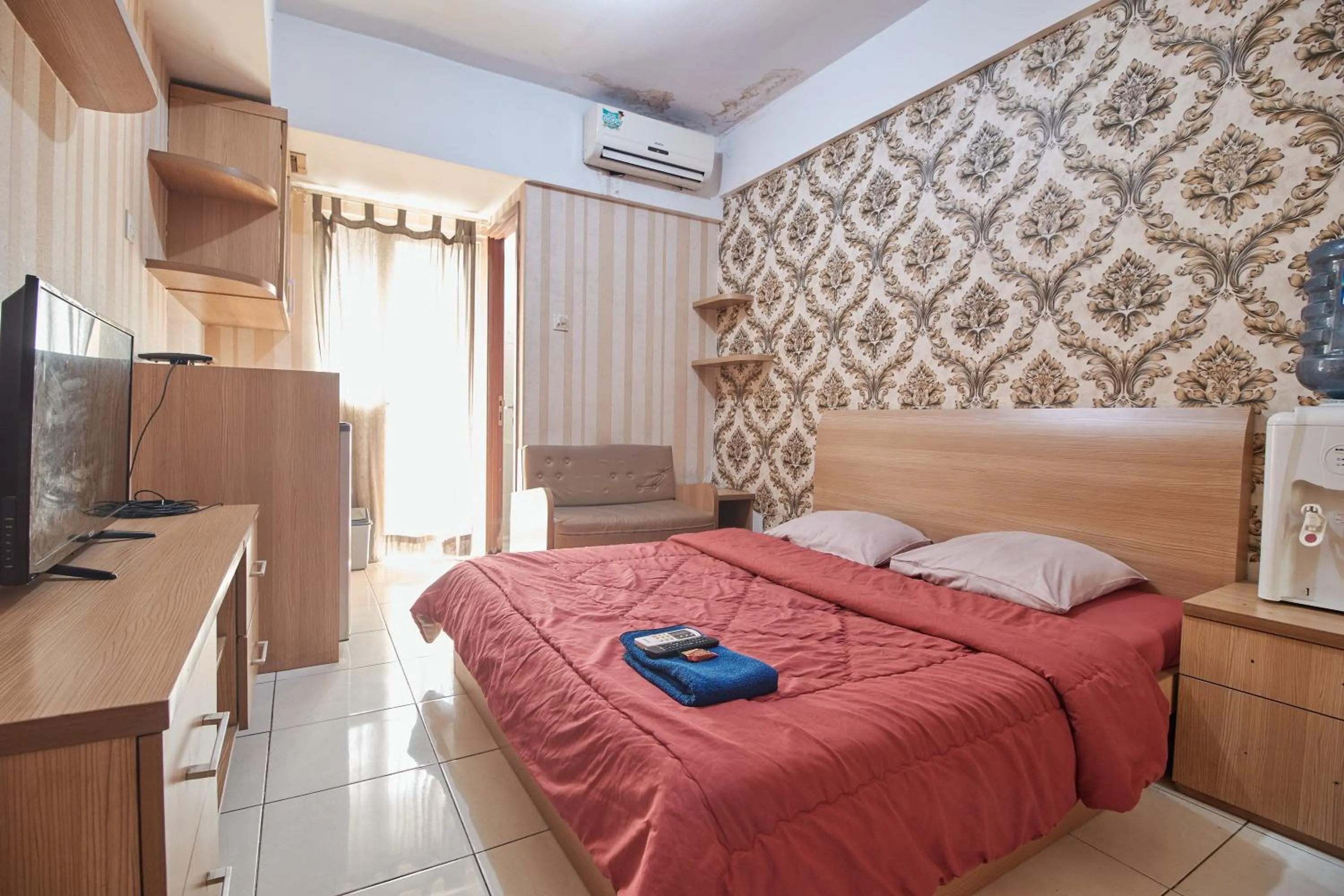 Bed in Apartment Green Lake View Ciputat by Celebrity Room