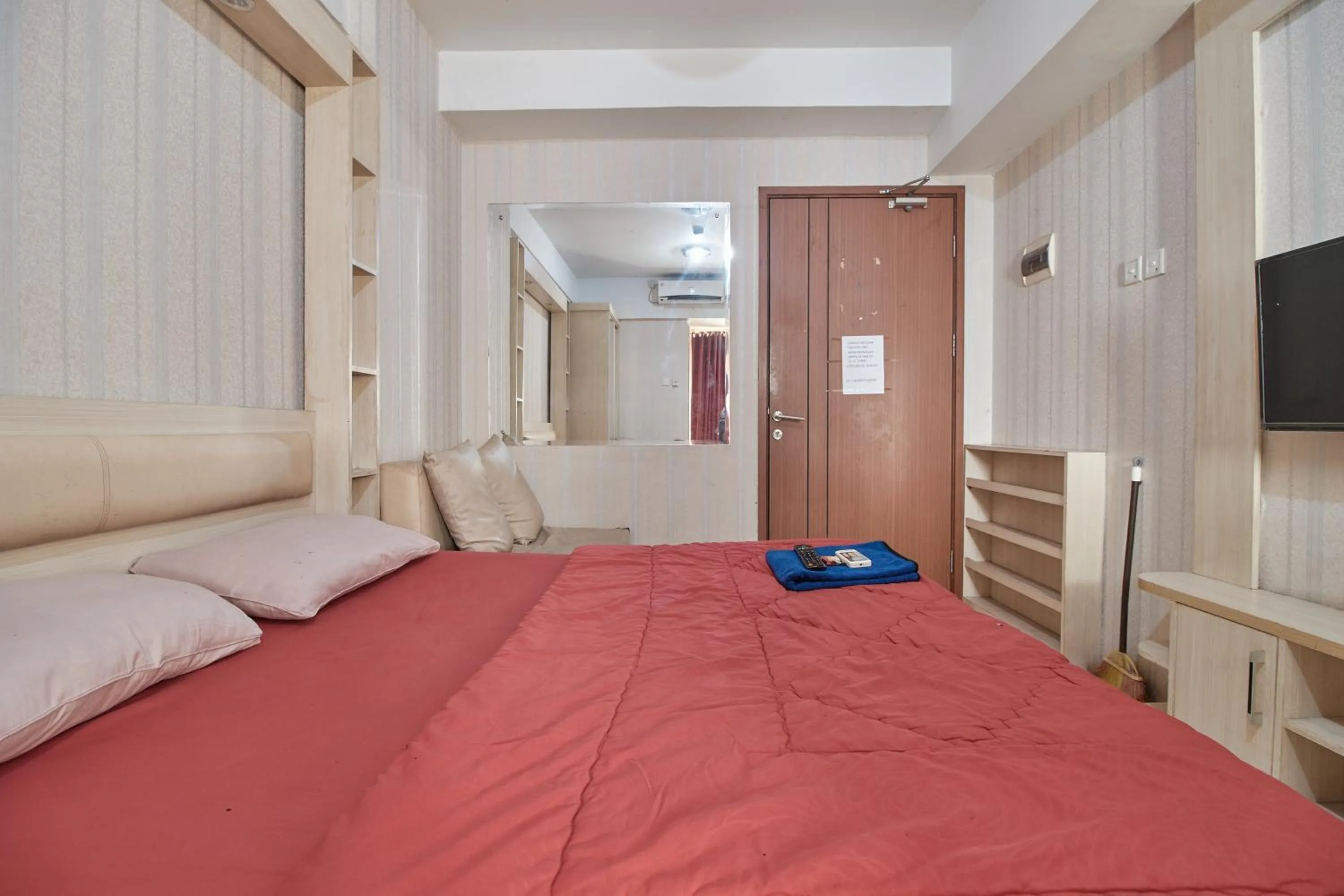 Bed in Apartment Green Lake View Ciputat by Celebrity Room