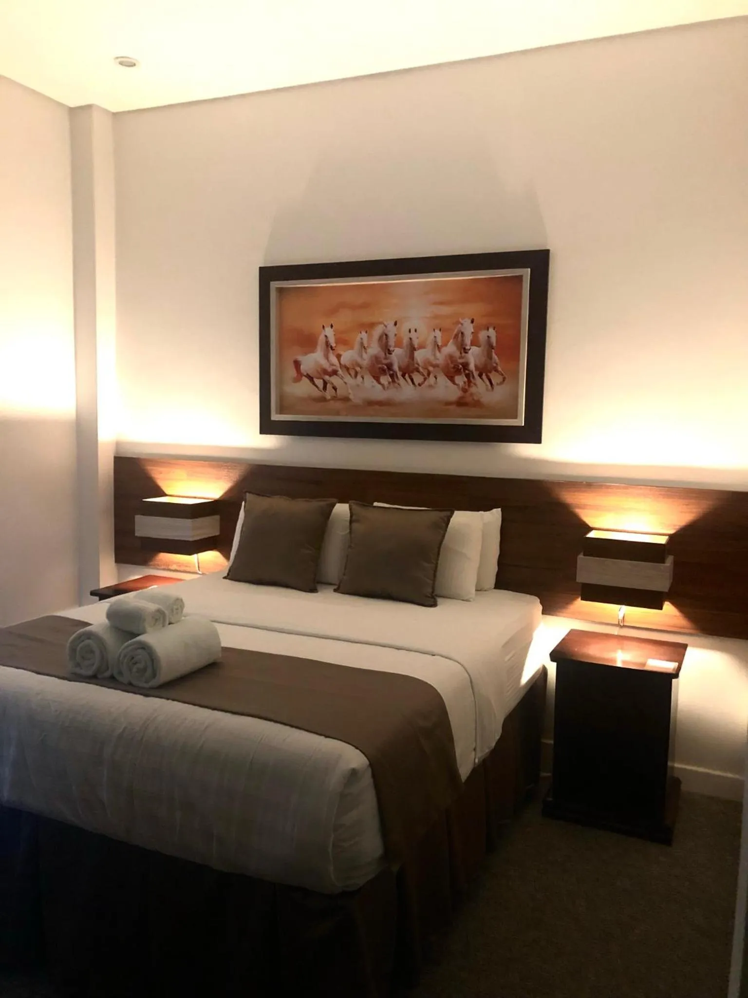 Bed in Seacliff Suites Hotel and Resort