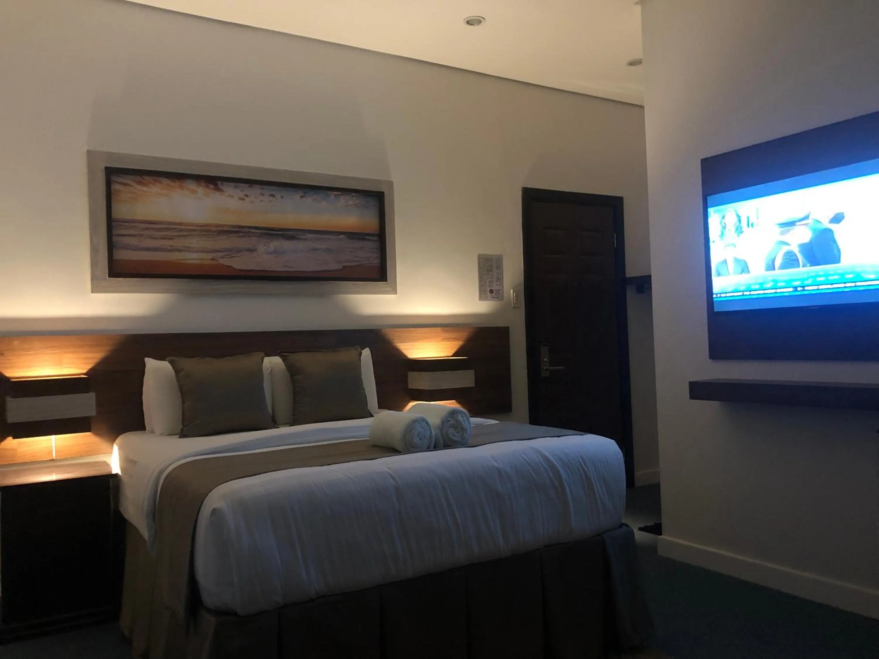 Bed in Seacliff Suites Hotel and Resort