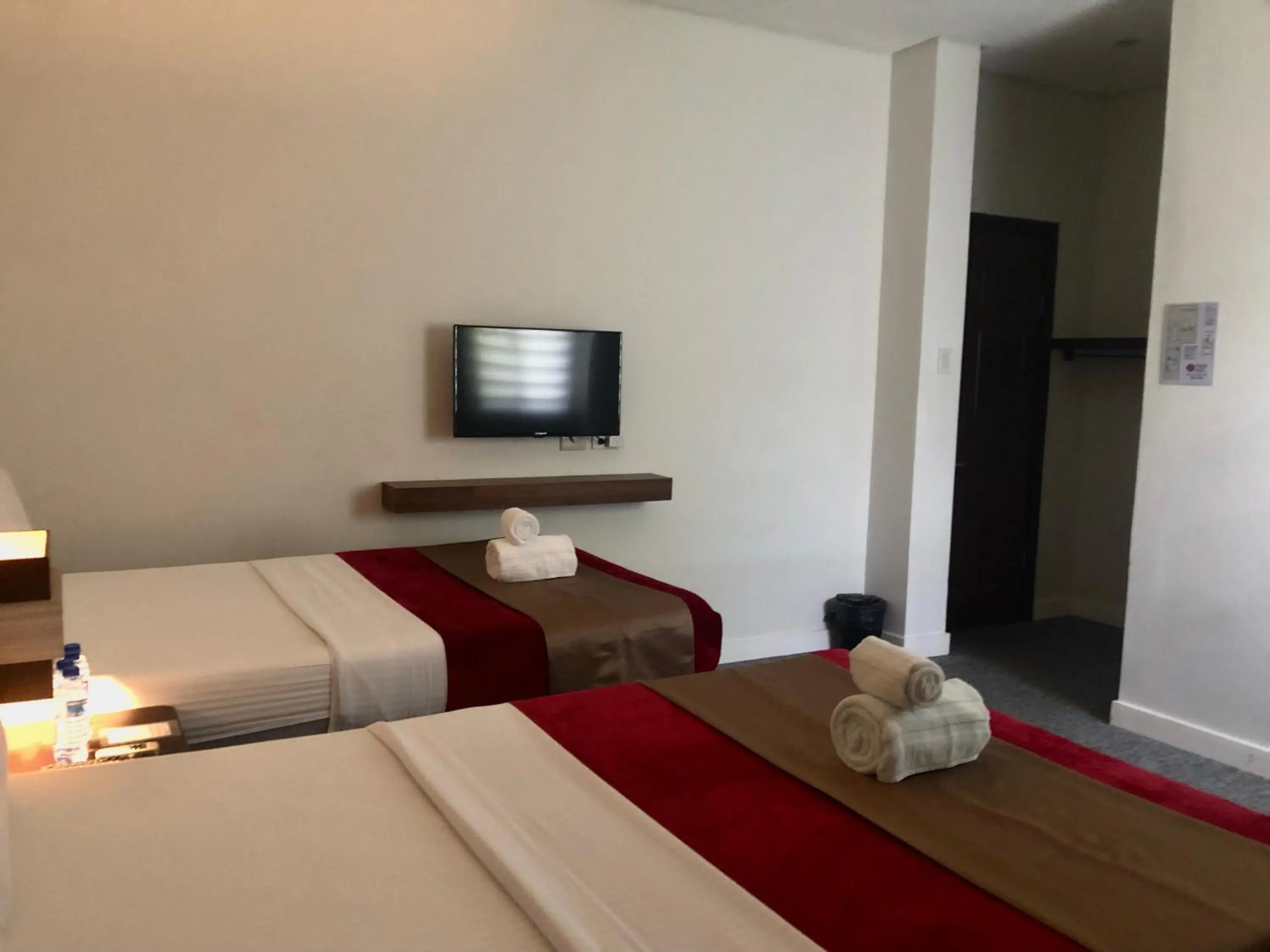 Bed in Seacliff Suites Hotel and Resort