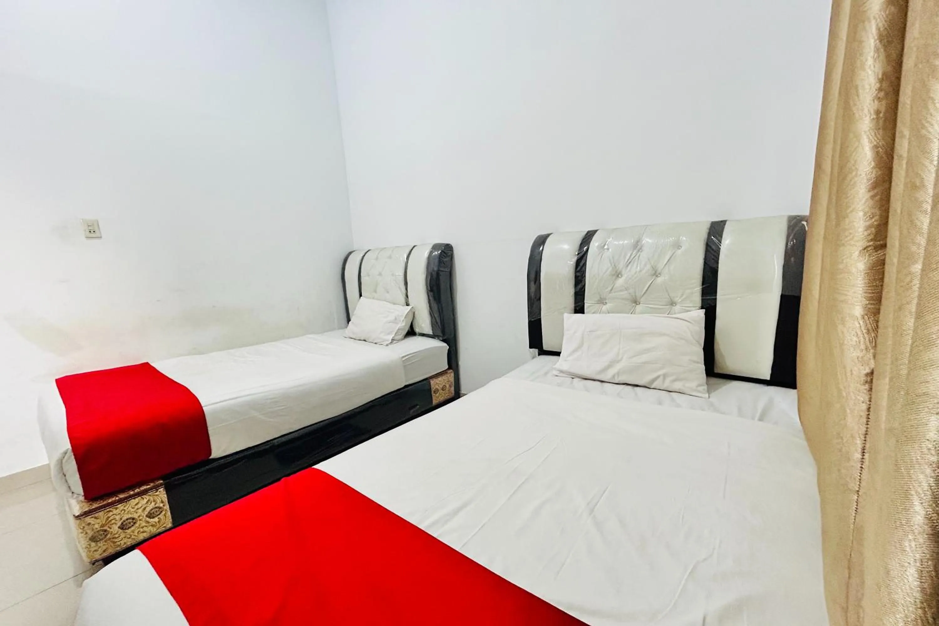 Bed in Shinta Guesthouse