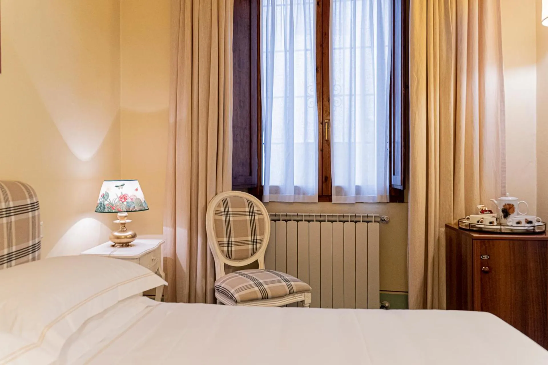 Bed in Casa Uffizi XIII Century Tower House Boutique Hotel