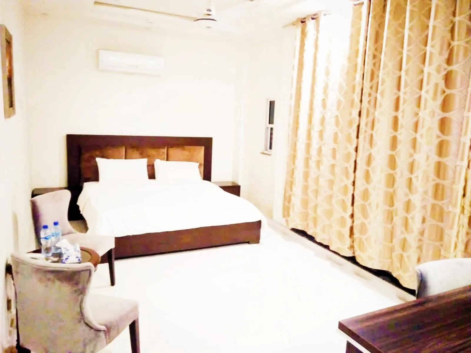 Bed in Jade Dragon Hotel DHA Lahore