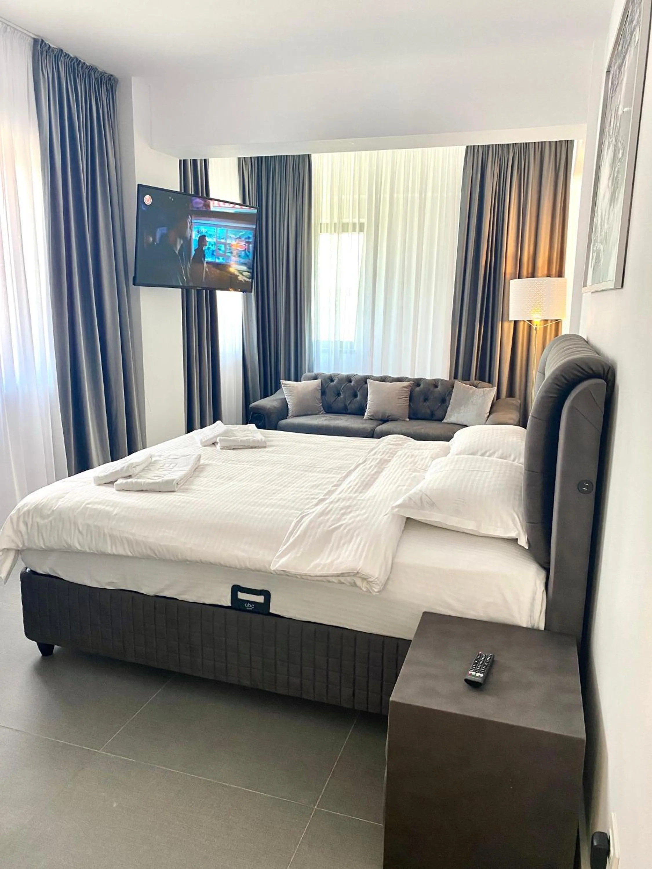 Bed in Enjoy Life Apartments