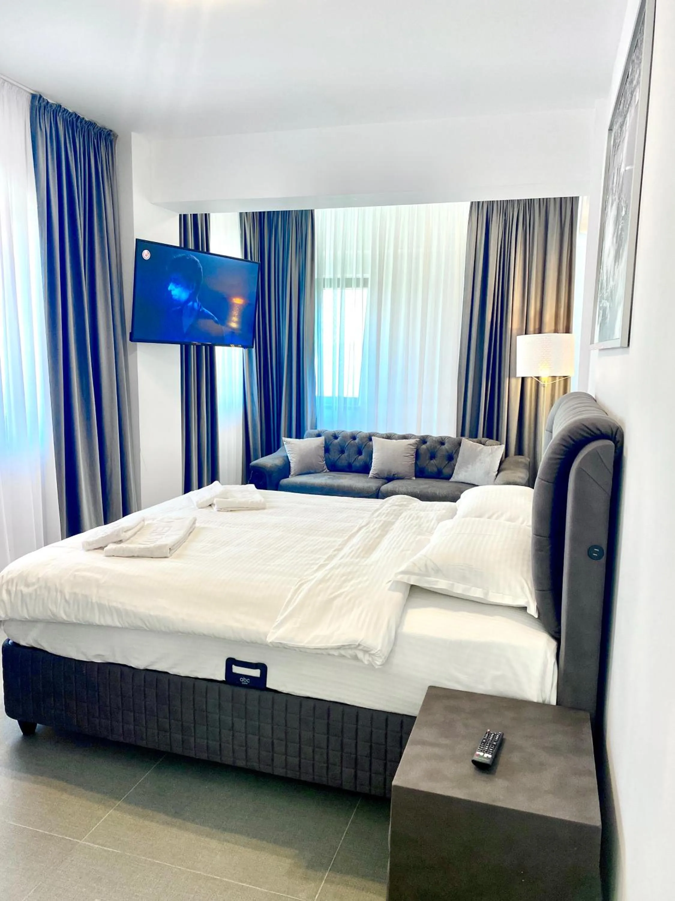 Bed in Enjoy Life Apartments