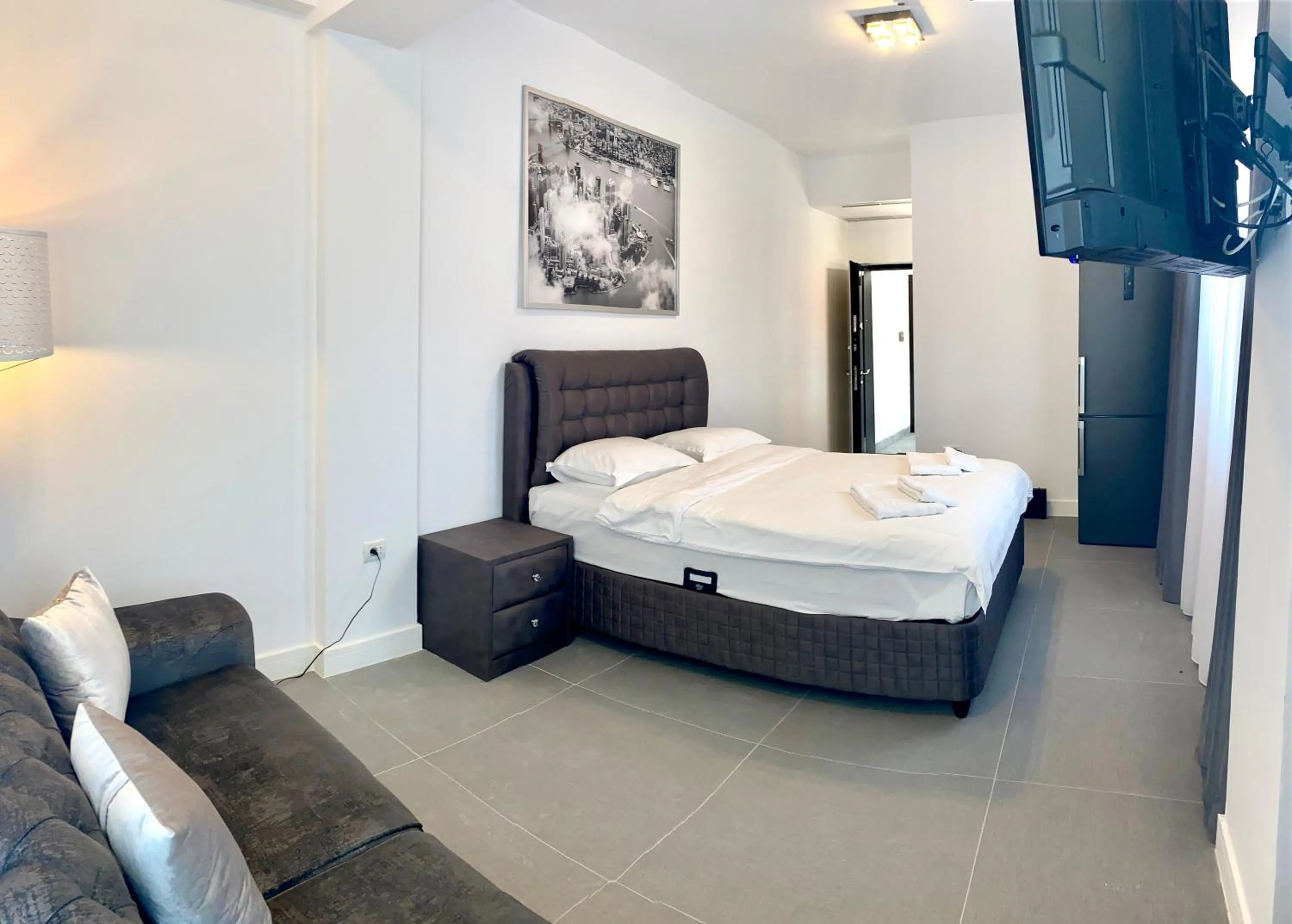 Bed in Enjoy Life Apartments