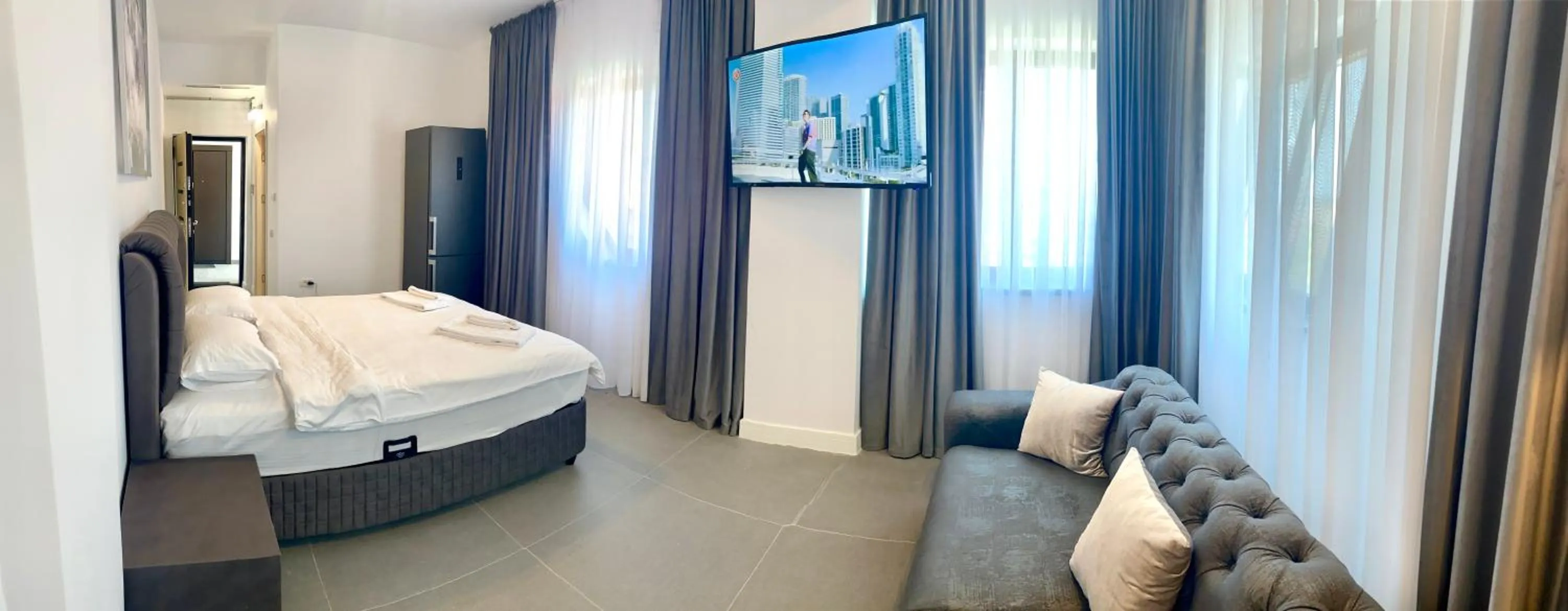 Bed in Enjoy Life Apartments