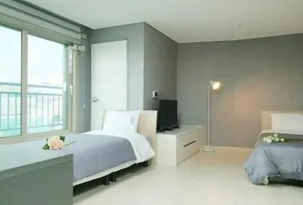 Bed in ARA Palace Hotel