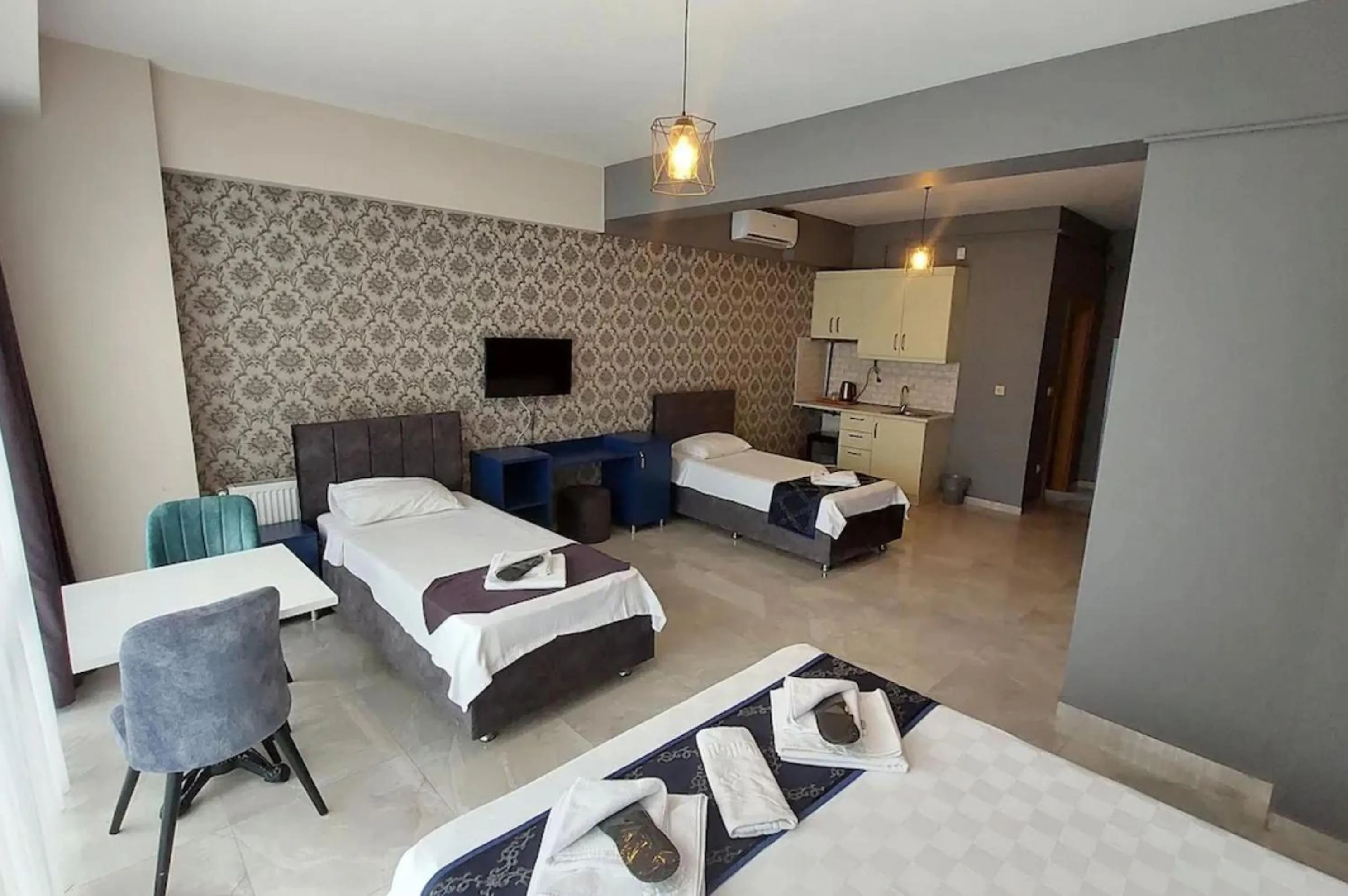 Bed in Mini Suite Otel