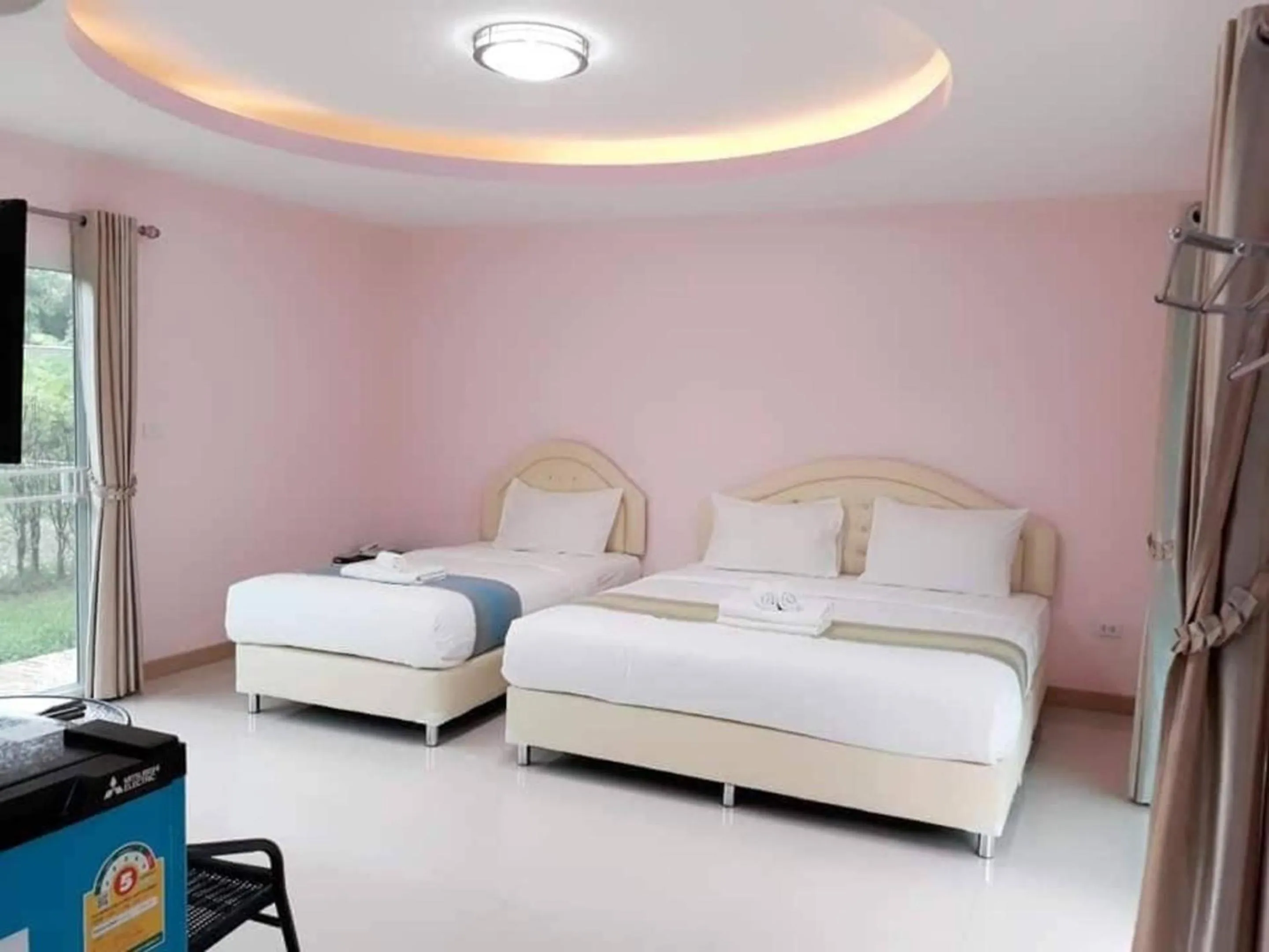 Photo of the whole room, Bed in AP Grand Resort