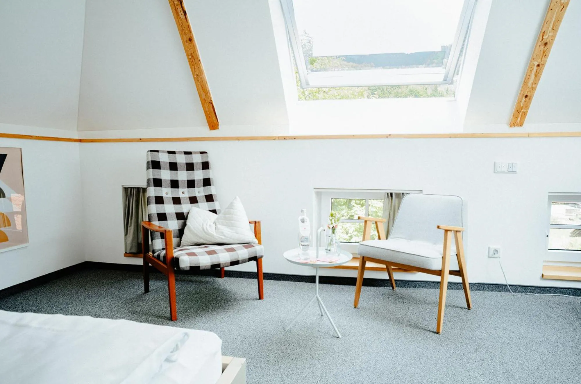 Seating area, Bed in Alpenrose Bayrischzell Hotel