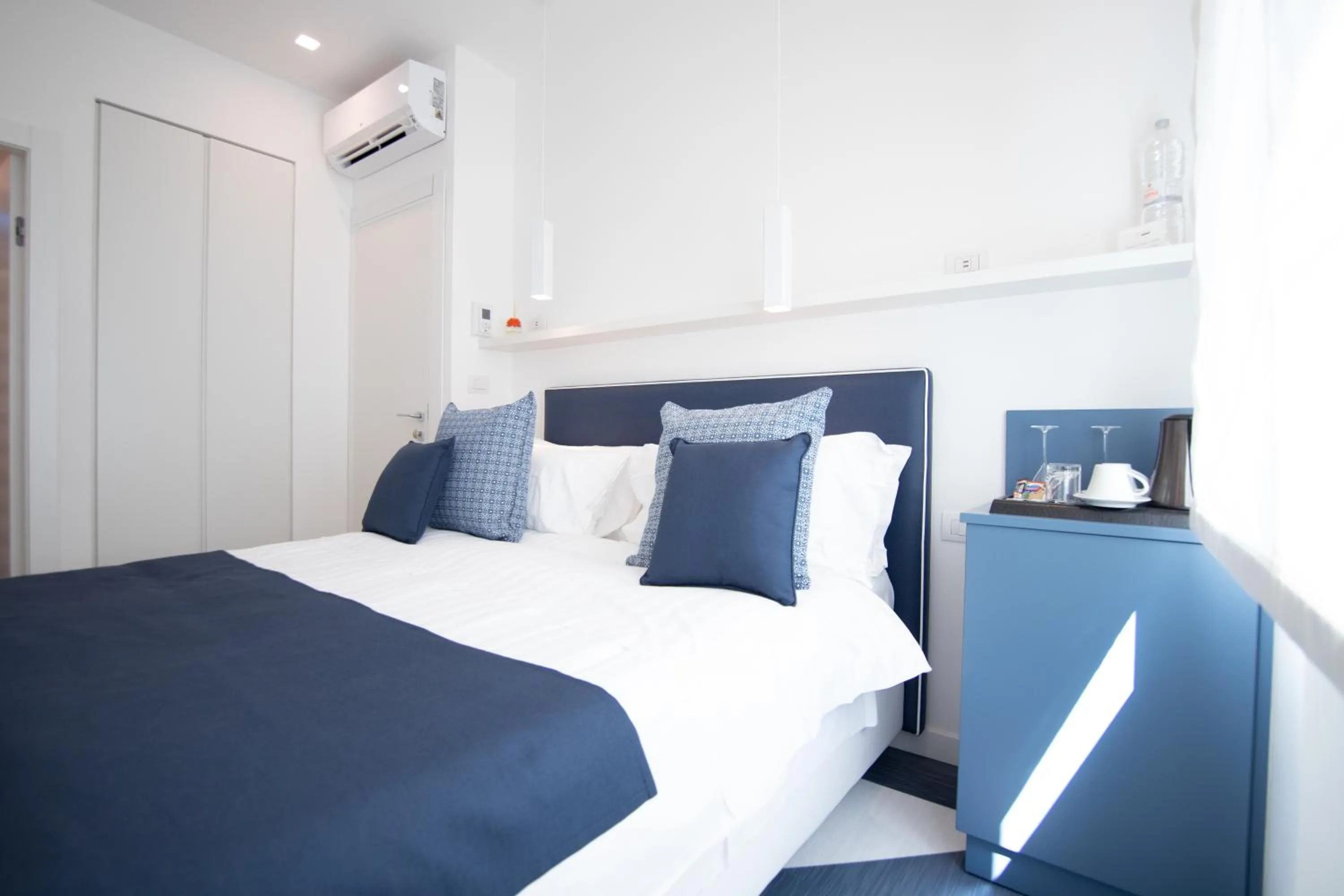 Bed in Villa Cettina Boutique Hotel