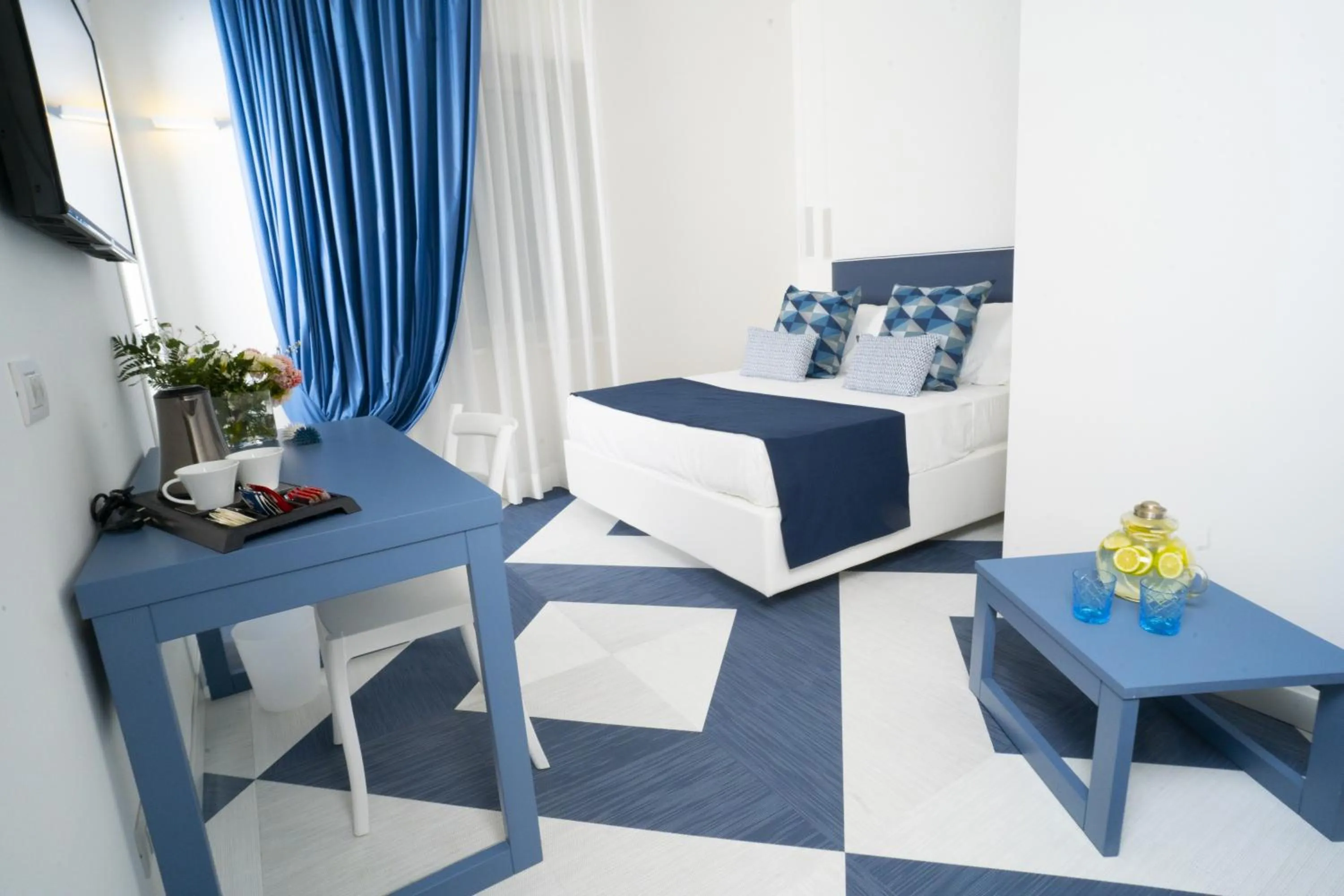 Bed in Villa Cettina Boutique Hotel