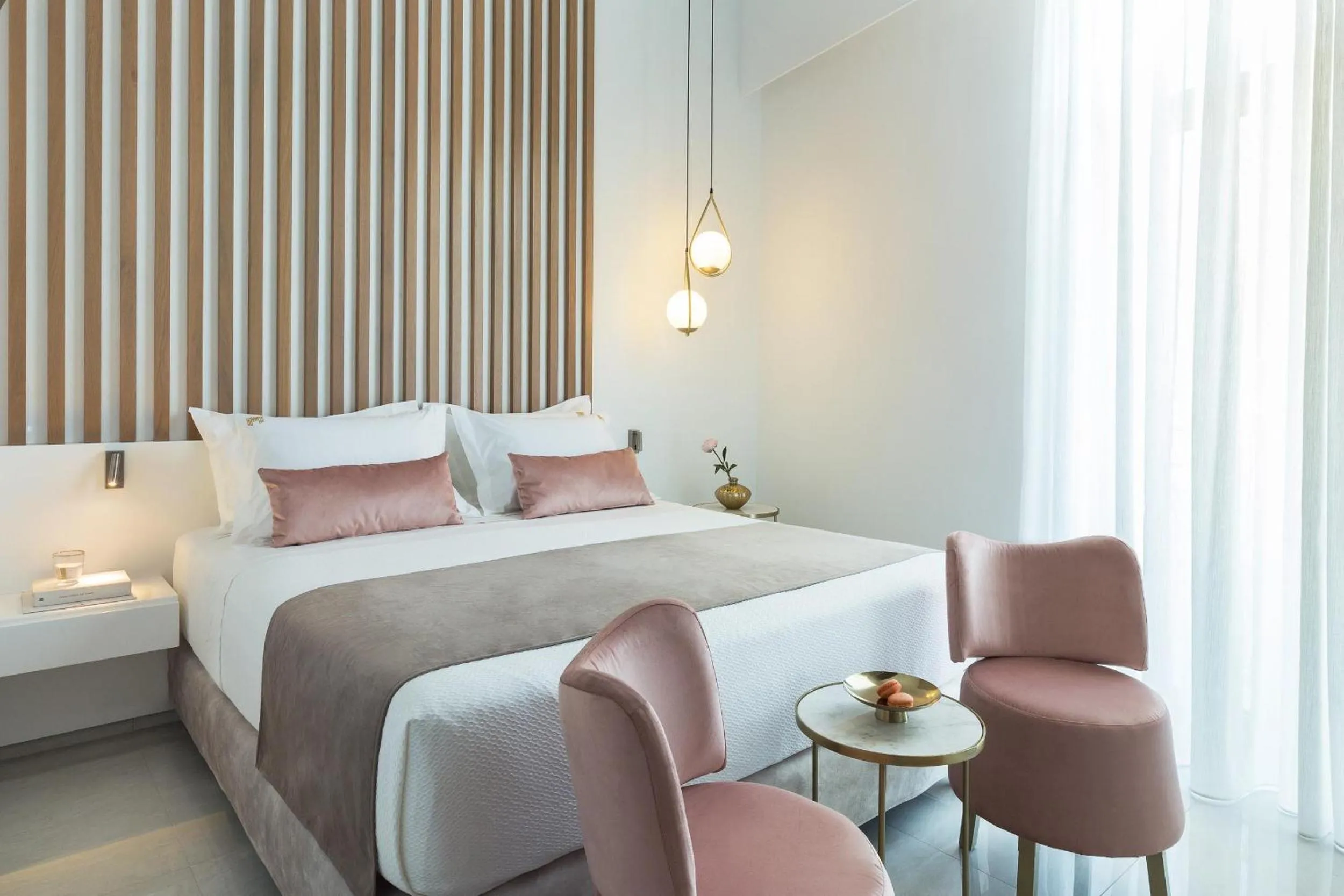 Bed in Mirabile Luxury Suites