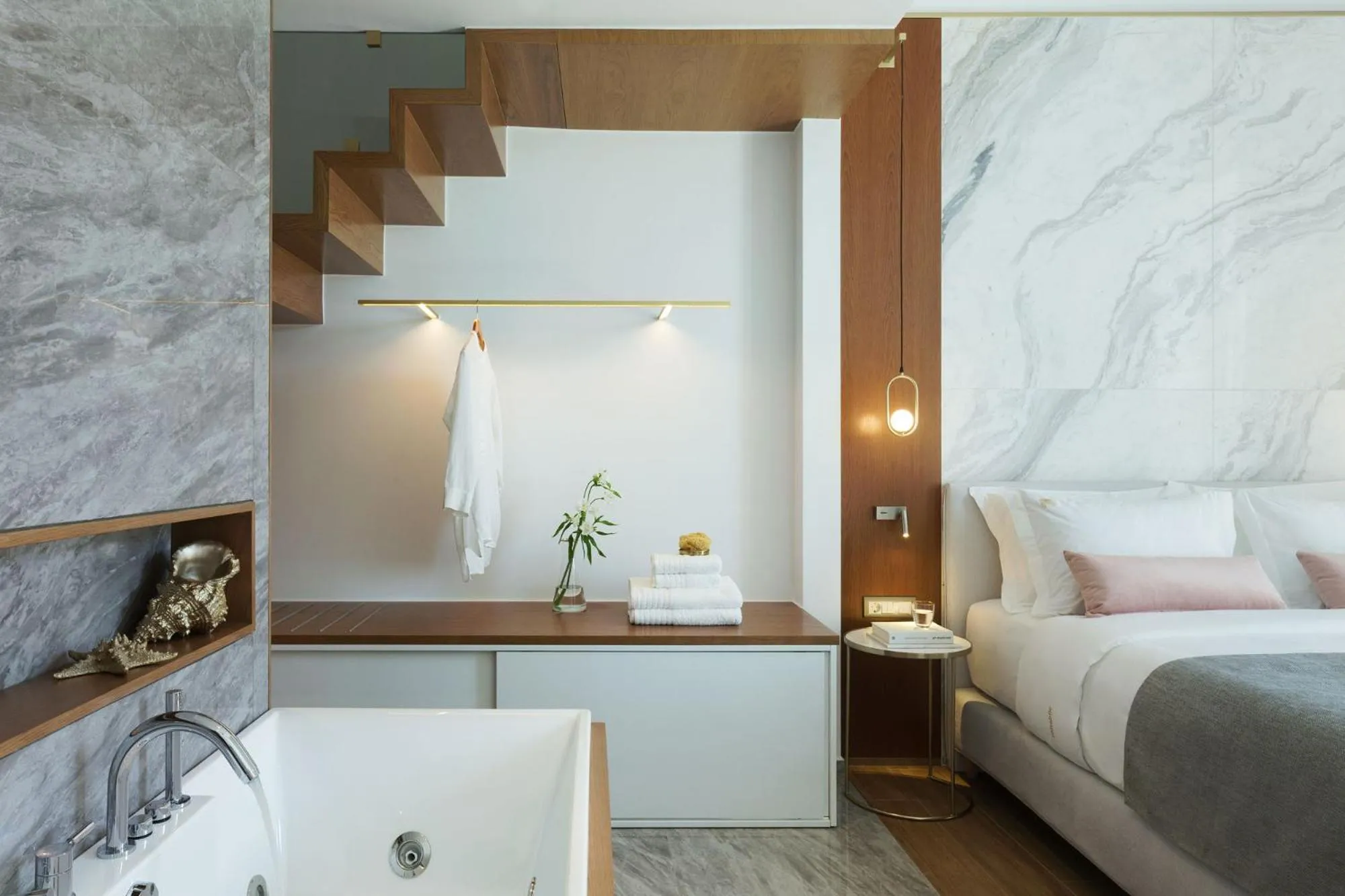 Bed in Mirabile Luxury Suites