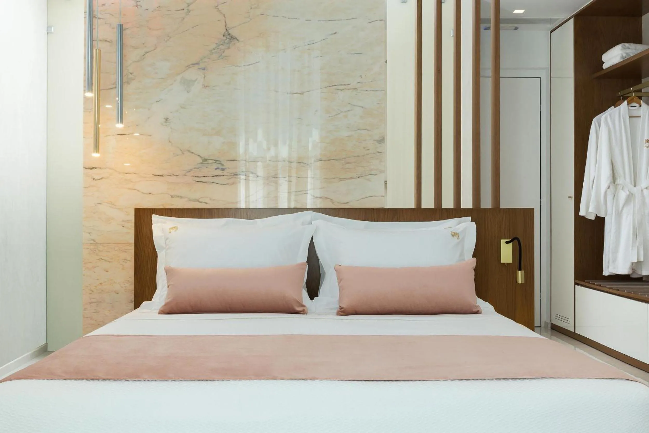 Bed in Mirabile Luxury Suites