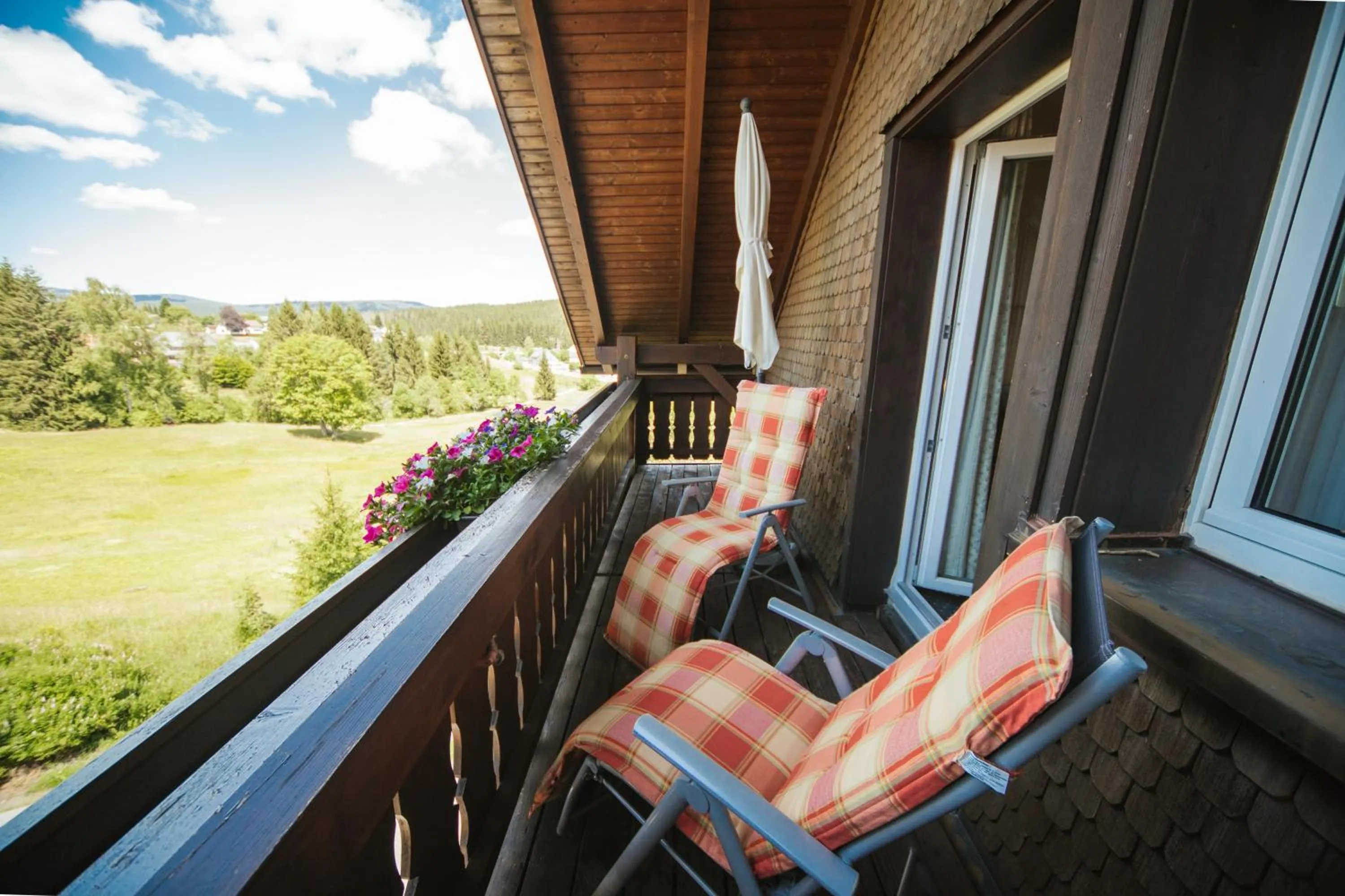 Garden view in Hotel Waldeck mit Restaurant "Florian'S"