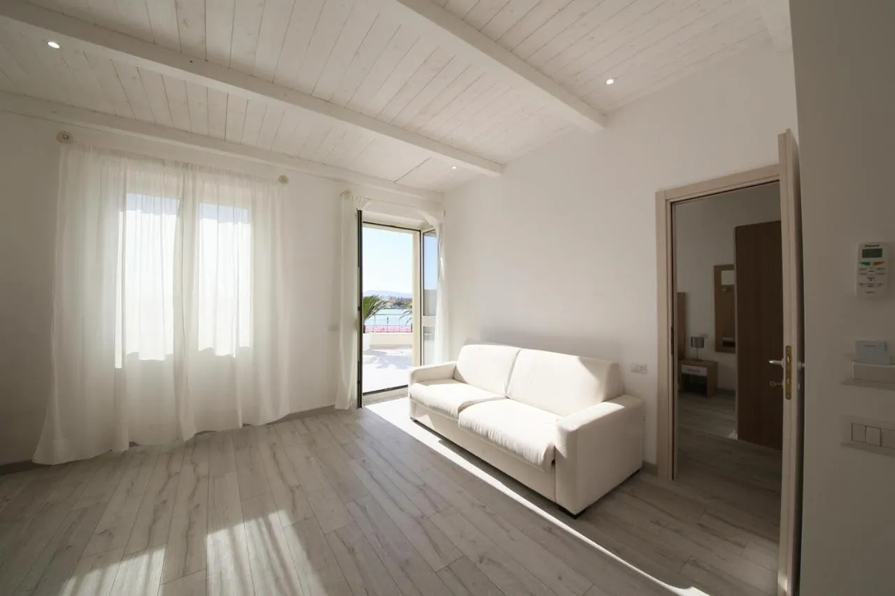 Photo of the whole room, Bed in La Promenade Rooms & Suites