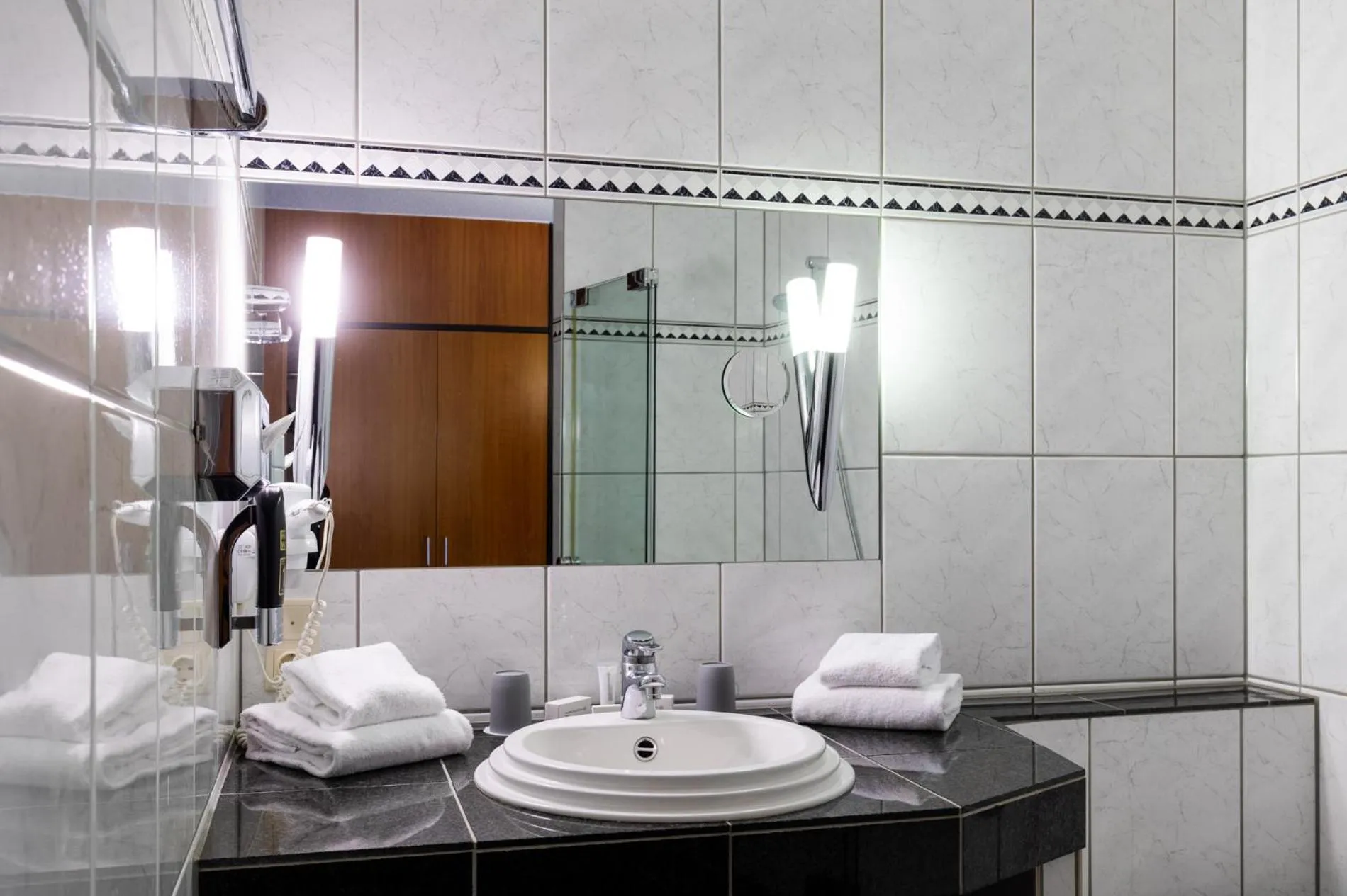 Bathroom in Sport- und Tagungshotel De Poort